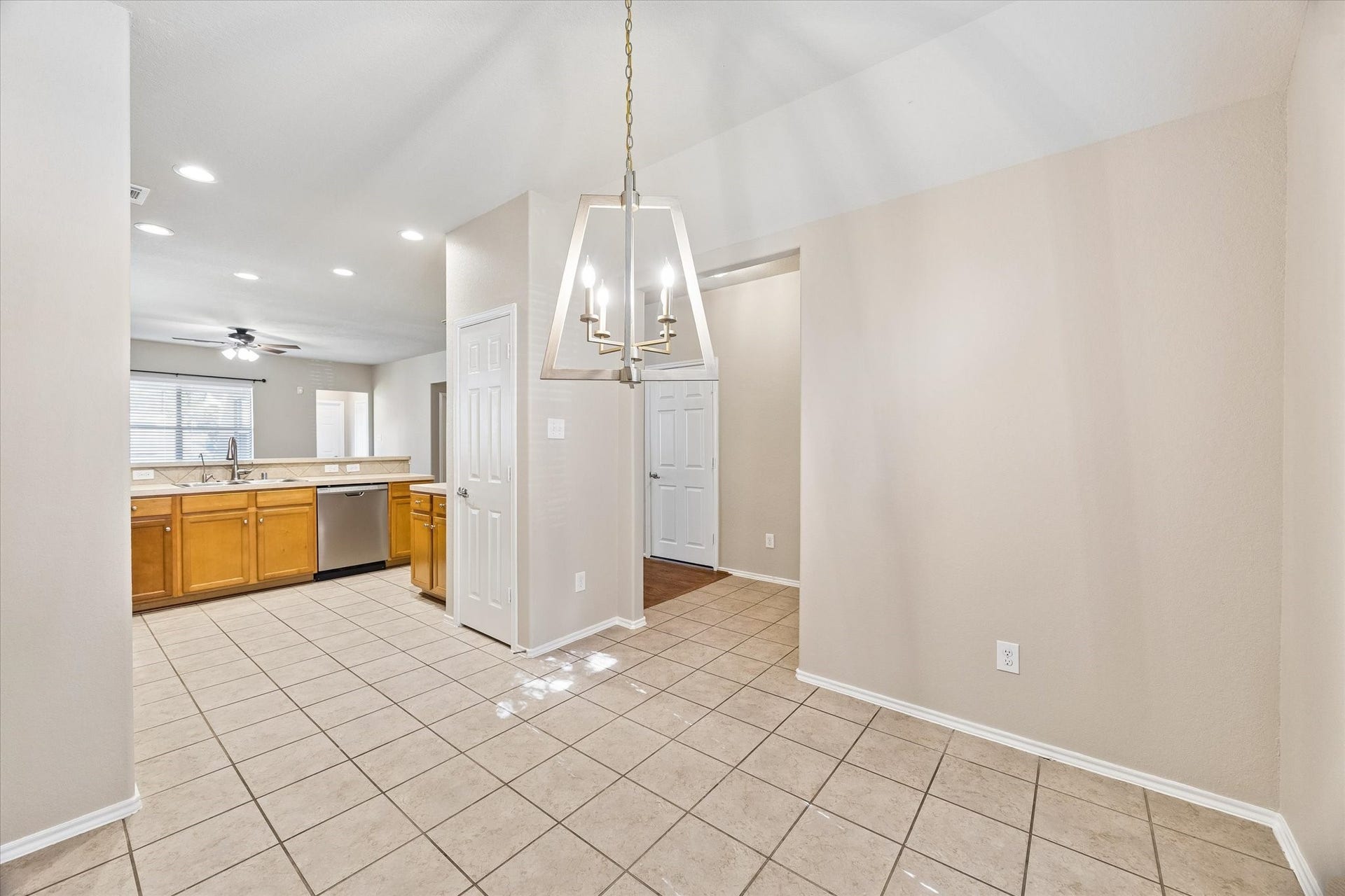 18127 Hillock Glen Lane, Cypress, TX 77429 The dining room connects to the kitchen, creating an easy flow for everyday meals and entertaining.