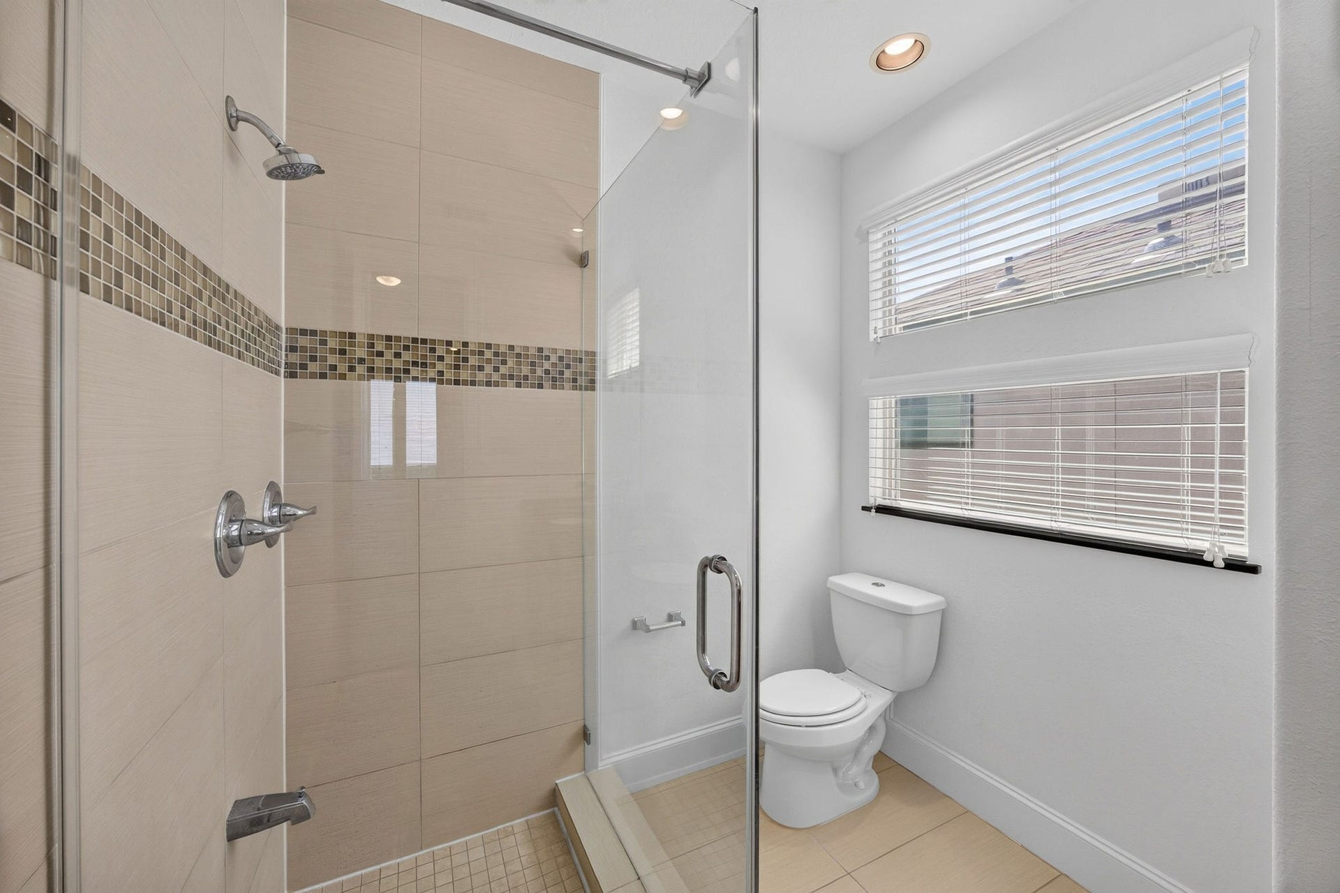 2307 Camden Drive, #C, Houston, TX 77021 Frameless glass shower with tile accent band