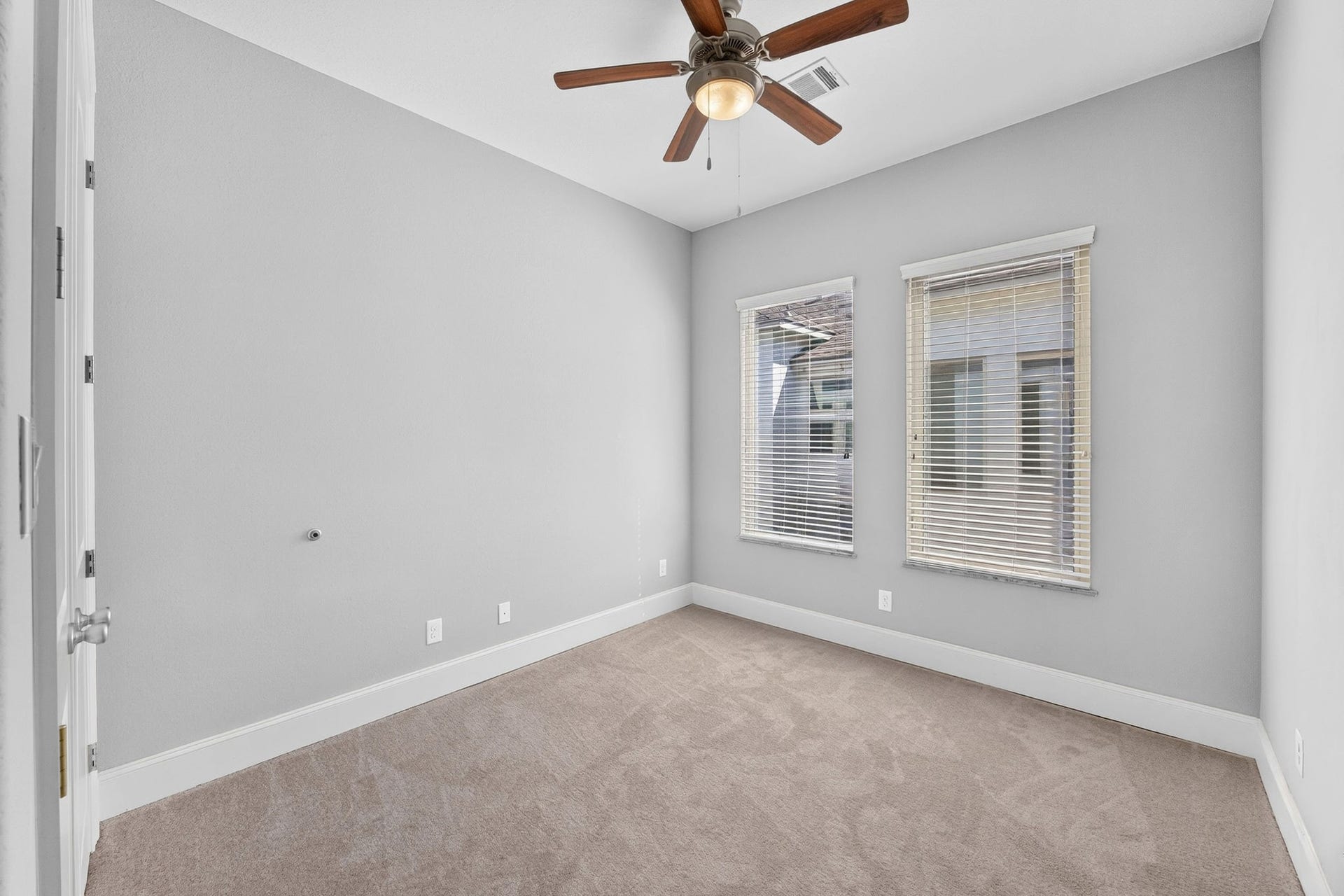 2307 Camden Drive, #C, Houston, TX 77021 Secondary bedroom with dual windows and ceiling fan