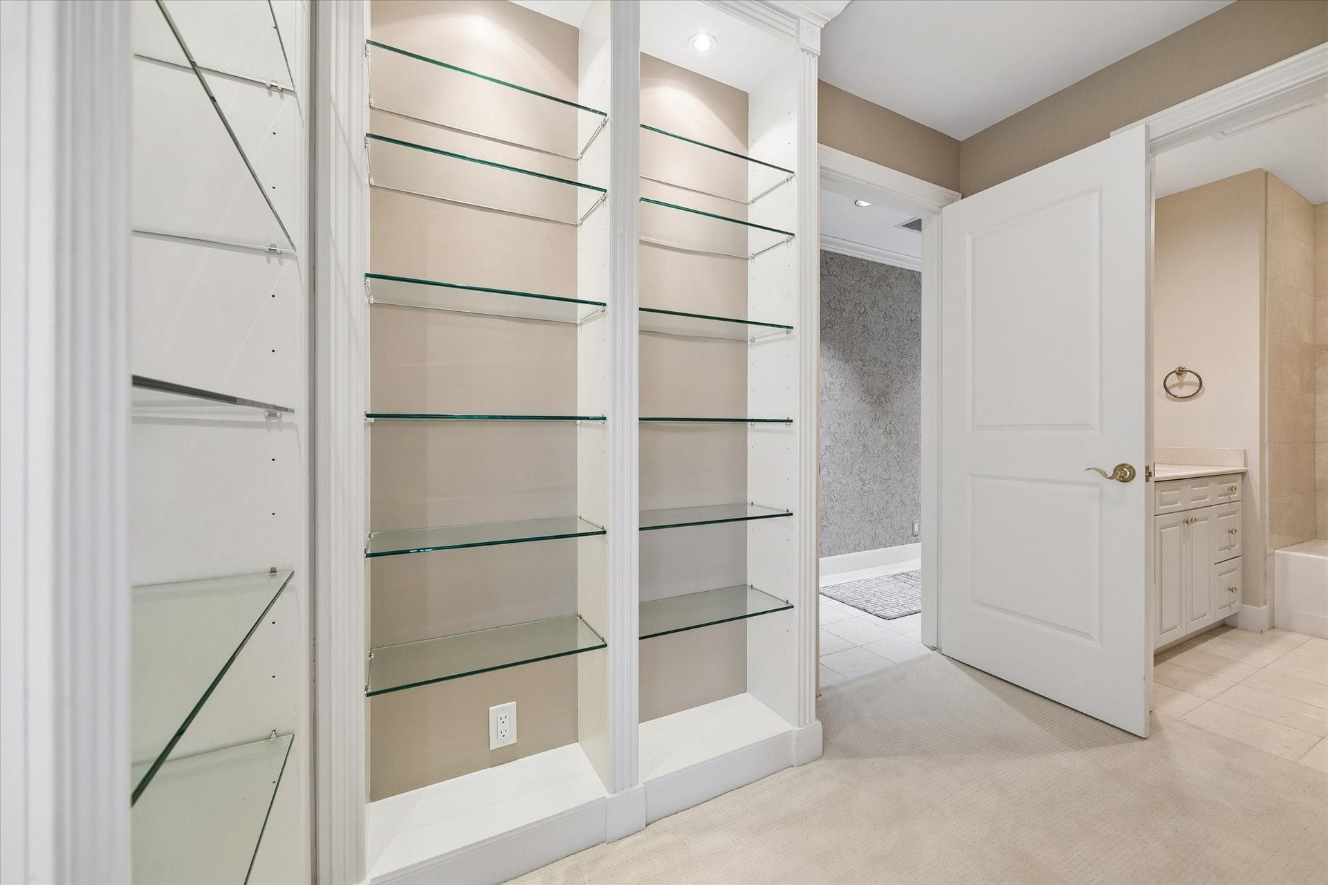 Built in book/display shelving in hallway off of secondary bedroom and study.