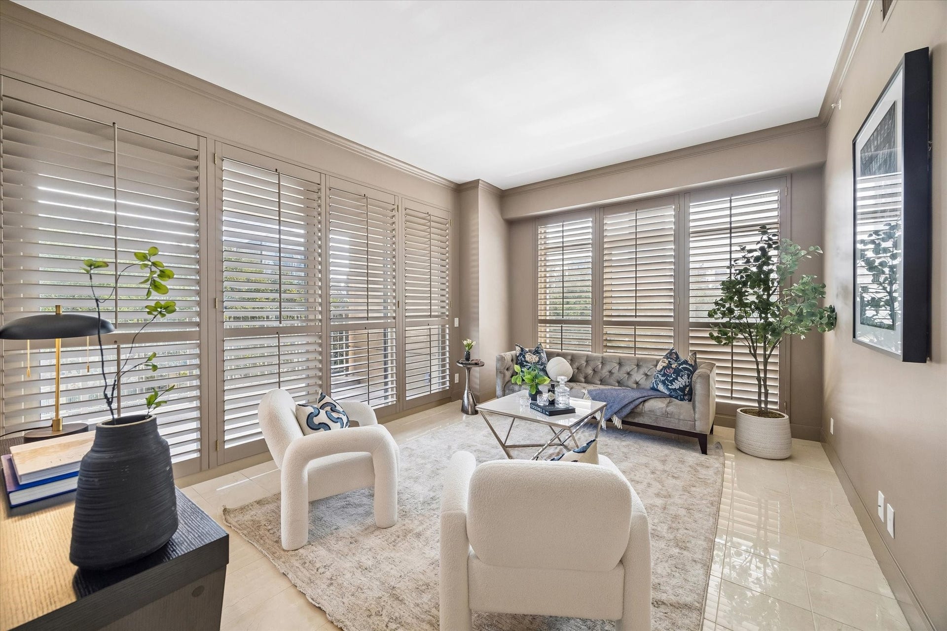 Plantation shutters throughout in study.