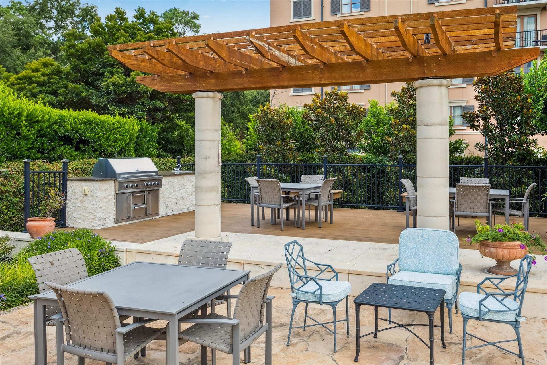 Outdoor grill and patio area at pool.