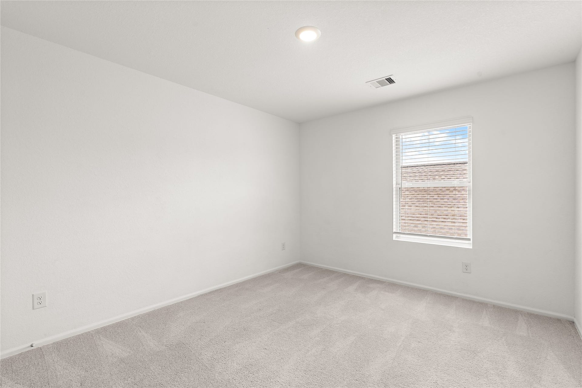 1938 Foxtail Creek Ct, Crosby, TX 77532 Secondary bedroom offering a comfortable layout, natural light, and plenty of space for family, guests, or a home office.