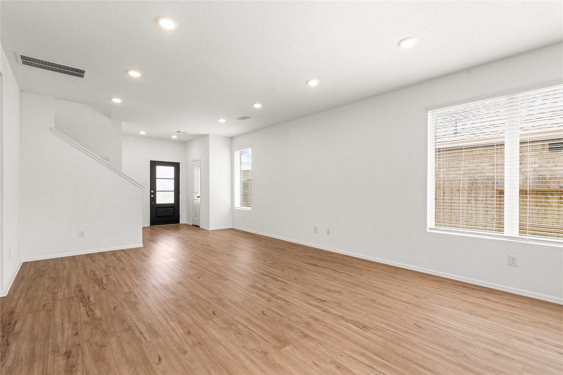 1938 Foxtail Creek Ct, Crosby, TX 77532 The open layout gives you plenty of flexibility to arrange your living space while staying connected to the rest of the home.