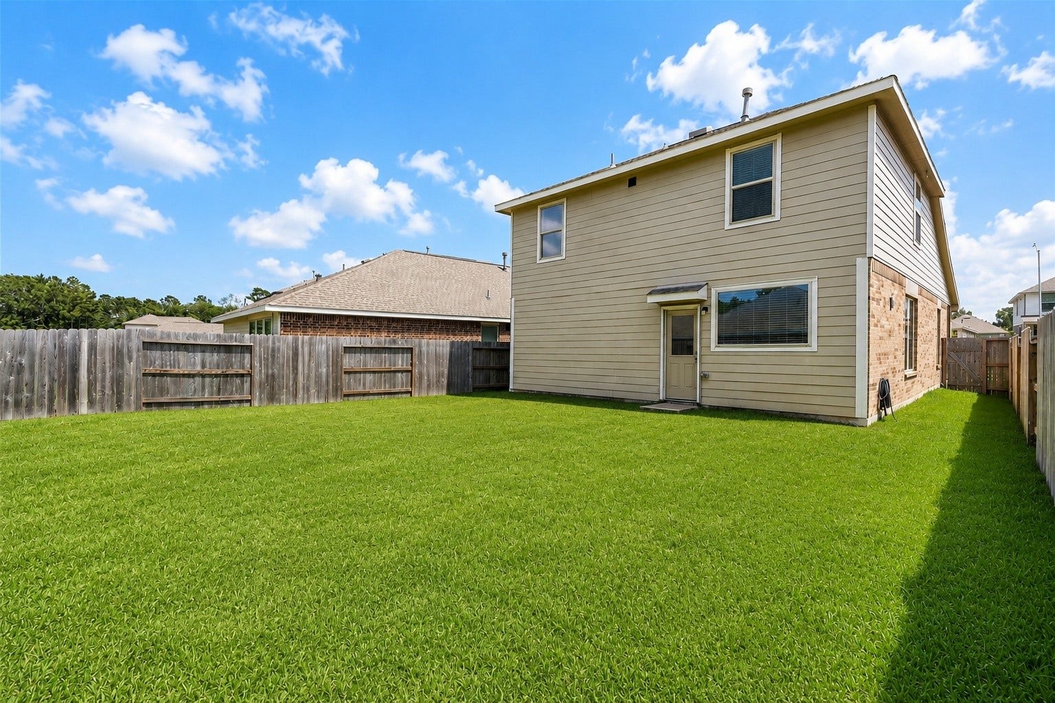 1938 Foxtail Creek Ct, Crosby, TX 77532 Whether it's weekend barbecues, pets, or a play area, the backyard offers plenty of room to enjoy.