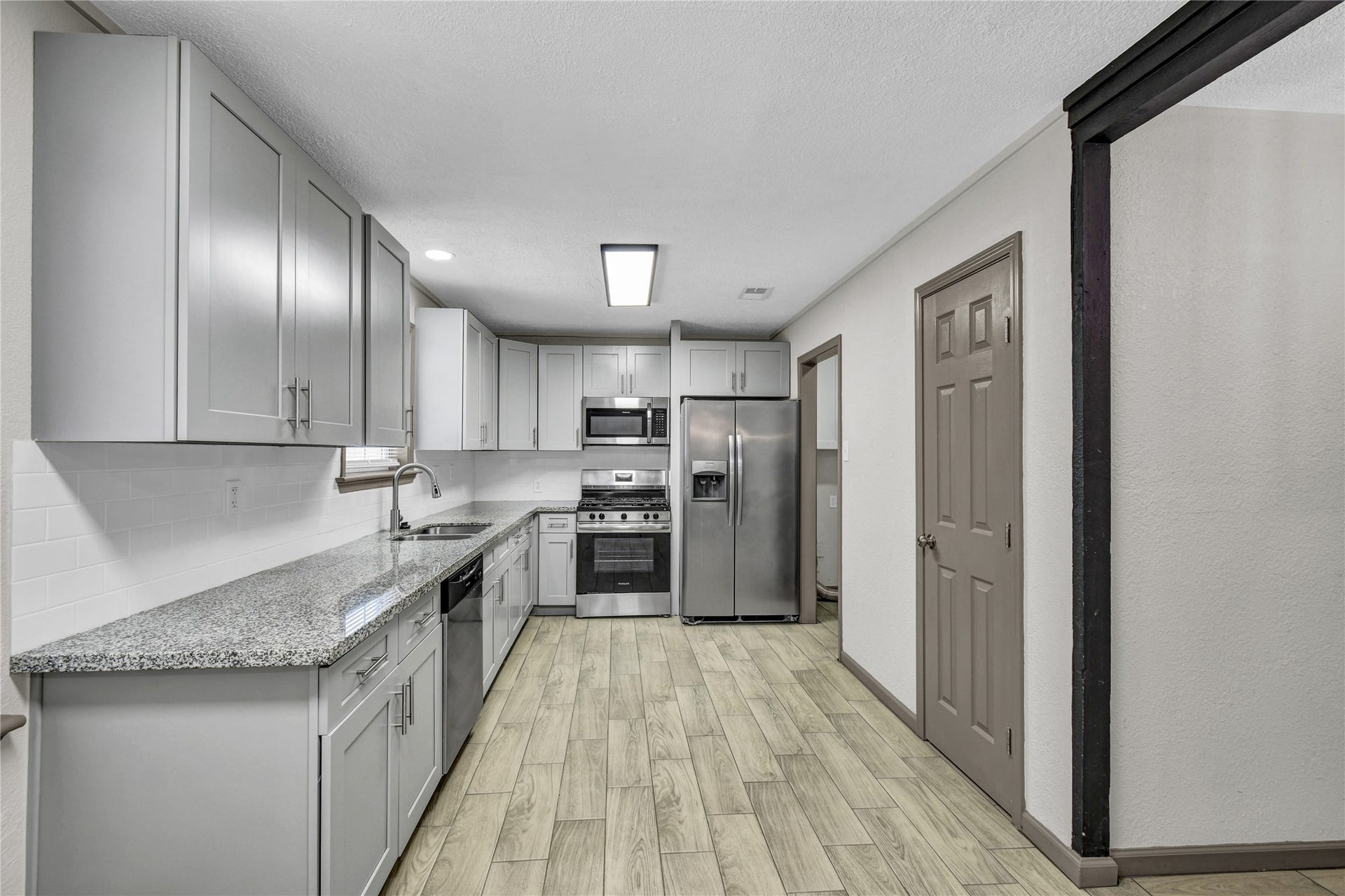 108 Crestview Drive, Hitchcock, TX 77563 Spacious Kitchen with stainless steel appliances
