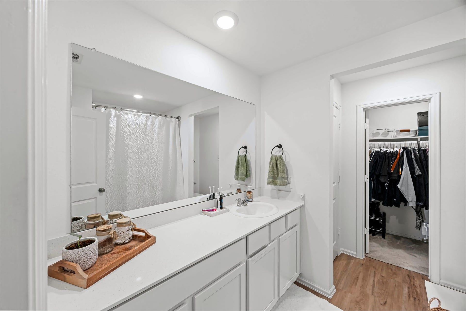 17811 Pemswood Drive, Hockley, TX 77447 Primary bath with a long vanity and access to the walk-in closet