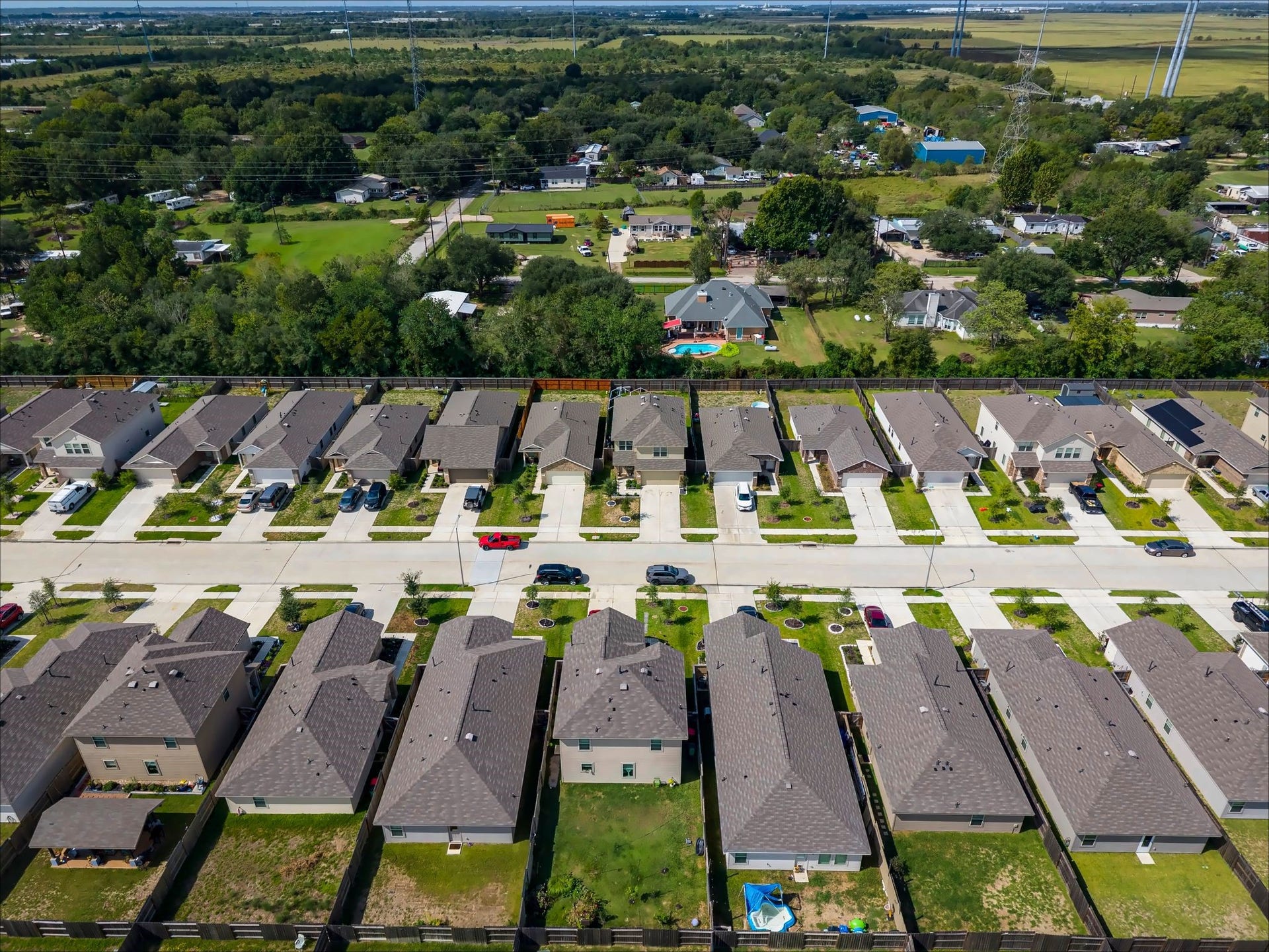 17811 Pemswood Drive, Hockley, TX 77447 Aerial view of the neighborhood and surrounding green space