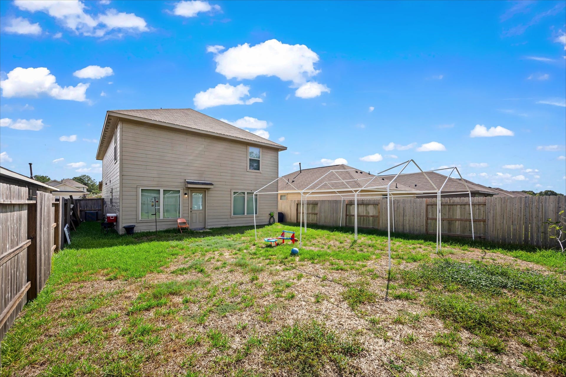 17811 Pemswood Drive, Hockley, TX 77447 Large fenced backyard with lots of open grass