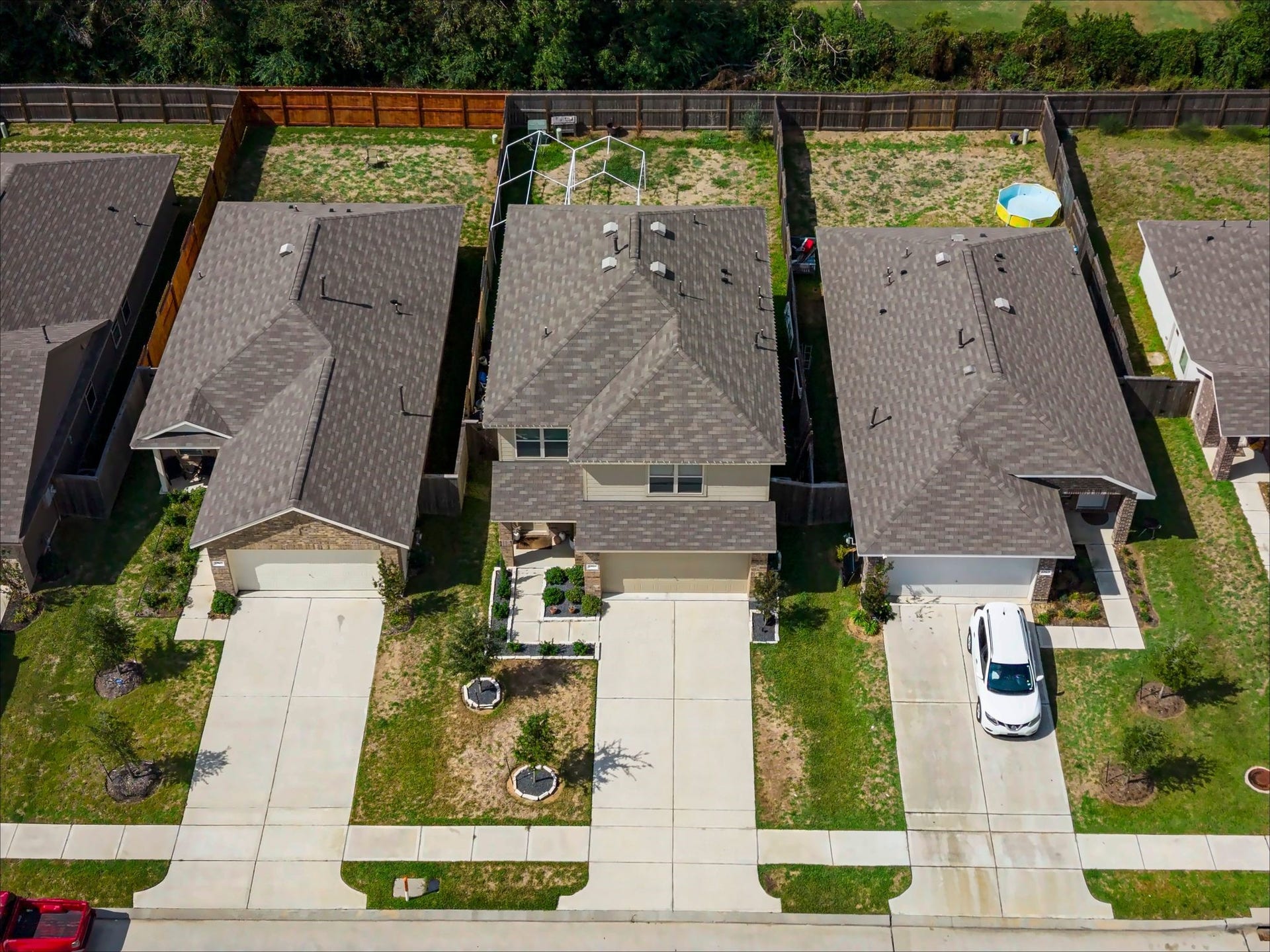 17811 Pemswood Drive, Hockley, TX 77447 Overhead front view of the driveway and front yard