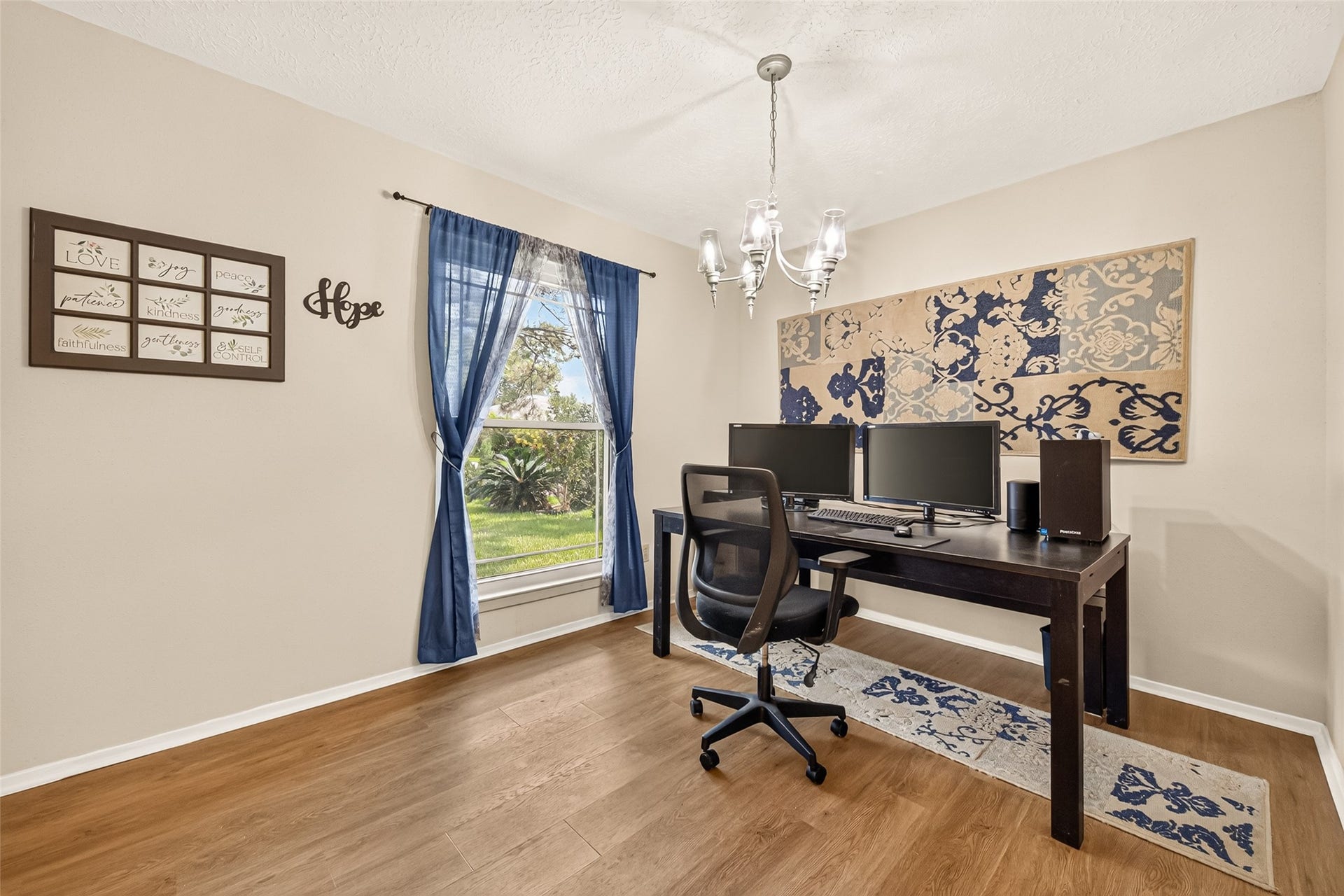 2123 Collingsfield Drive, Sugar Land, TX 77478 Bright and inviting home office featuring a large window