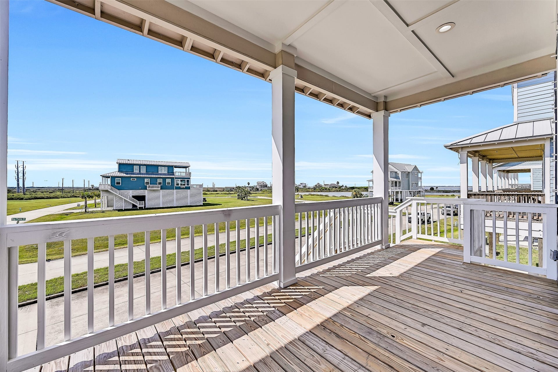 1627 Bay Pointe Drive, Galveston, TX 77554 As you make your way upstairs, youll be welcomed by the spacious front deck.