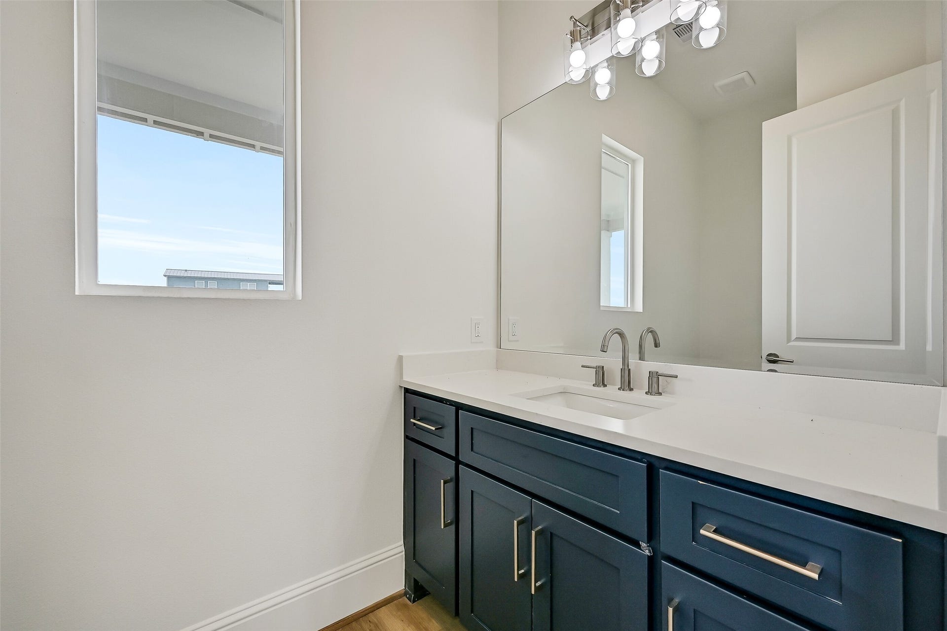 1627 Bay Pointe Drive, Galveston, TX 77554 The half bathroom located on this level.