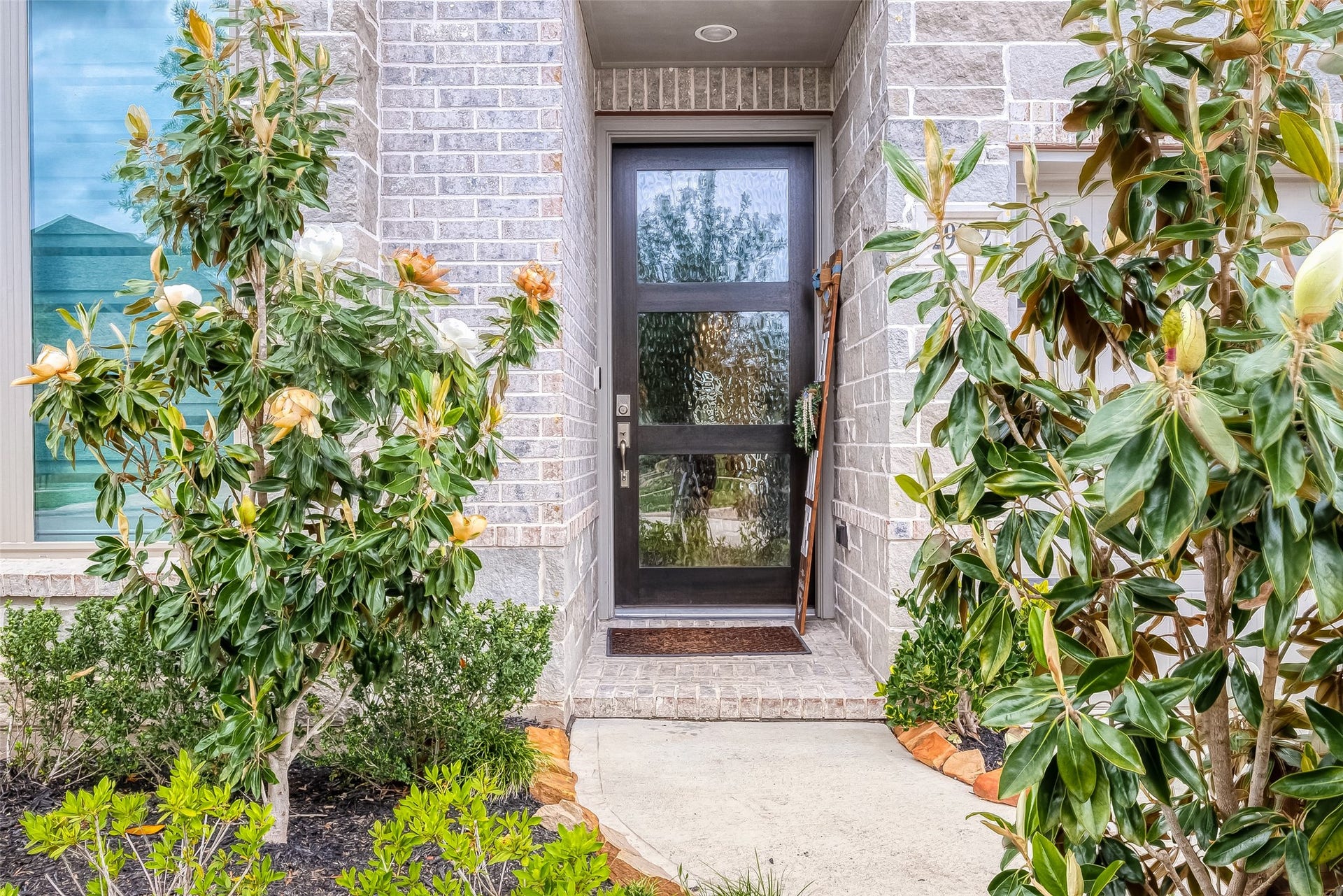 29042 Hauter Way, Fulshear, TX 77441 Welcoming front entry surrounded by landscaping