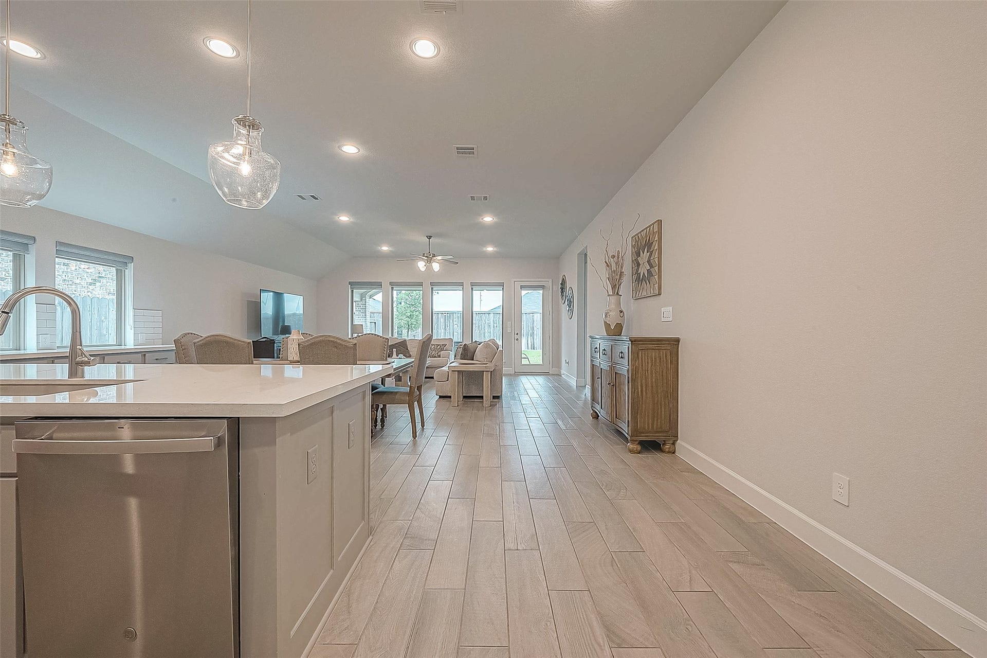 29042 Hauter Way, Fulshear, TX 77441 Open-concept kitchen and living area filled with natural light