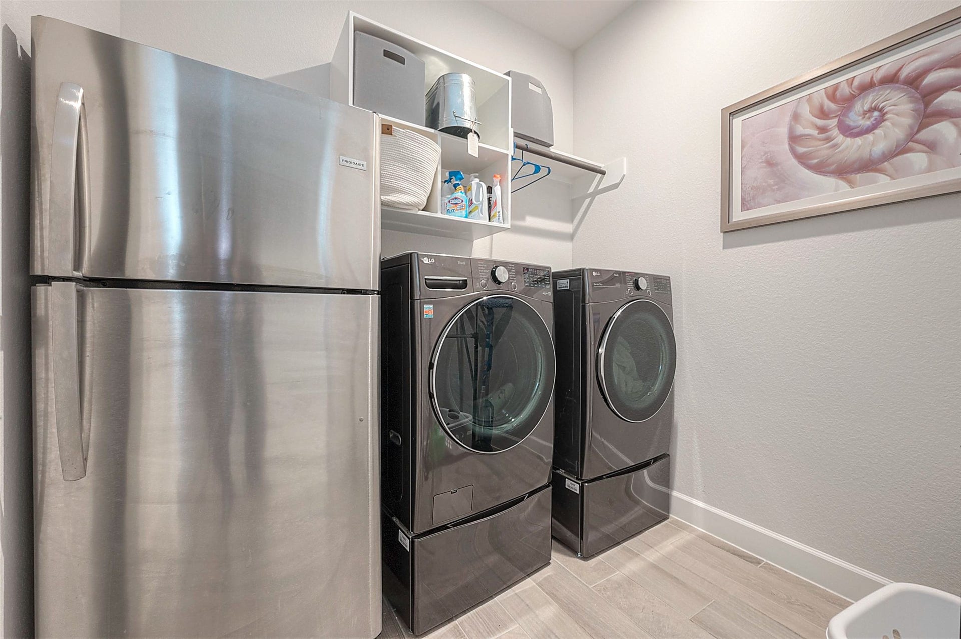 29042 Hauter Way, Fulshear, TX 77441 Laundry room with built-in cabinetry and space for full-size appliances