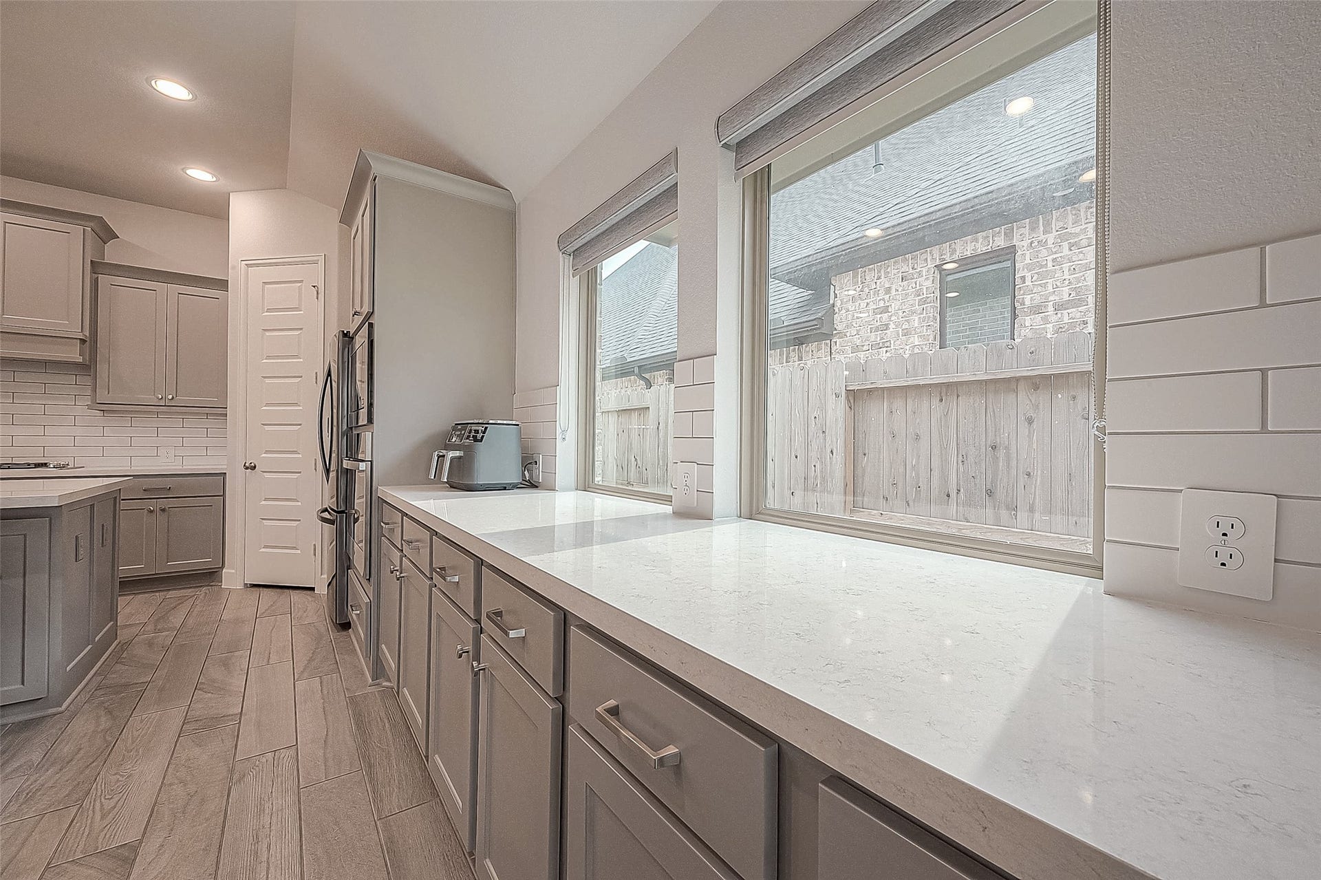 29042 Hauter Way, Fulshear, TX 77441 Kitchen counter space with bright window views