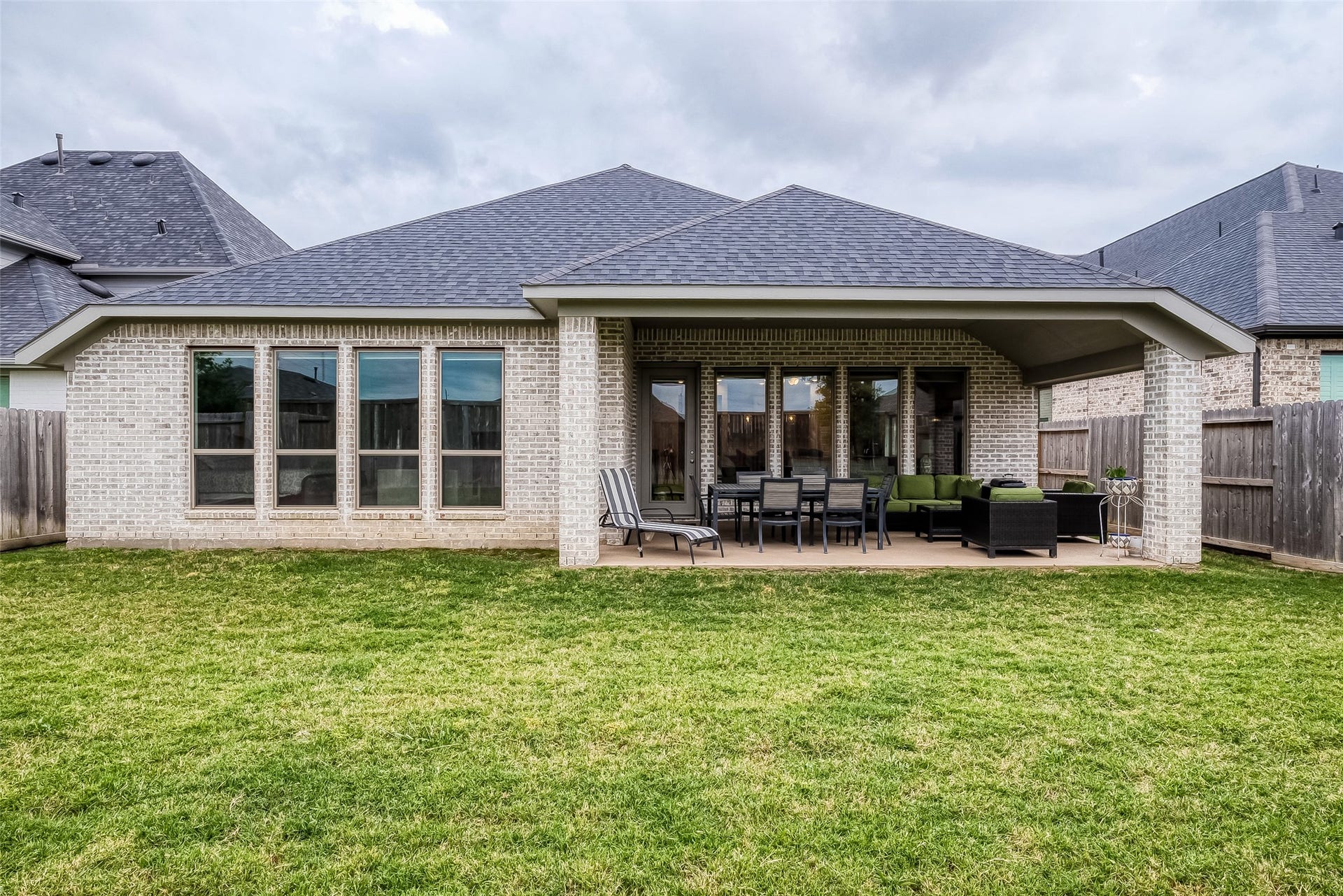 29042 Hauter Way, Fulshear, TX 77441 1. Rear exterior view highlighting the outdoor living space