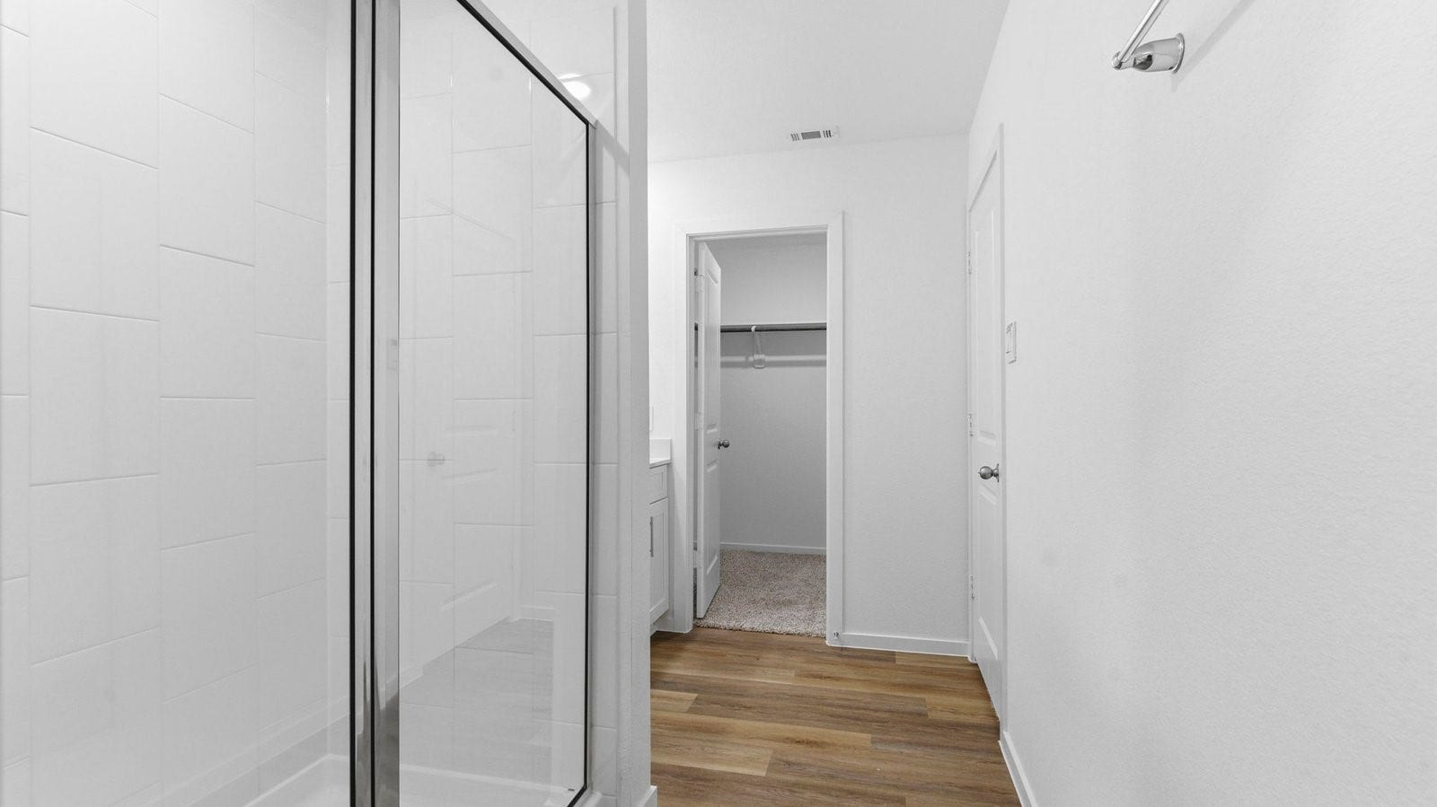 3510 Wild Mustang Street, League City, TX 77511 Primary bathroom with a glass-enclosed standing shower and separate soaking tub.