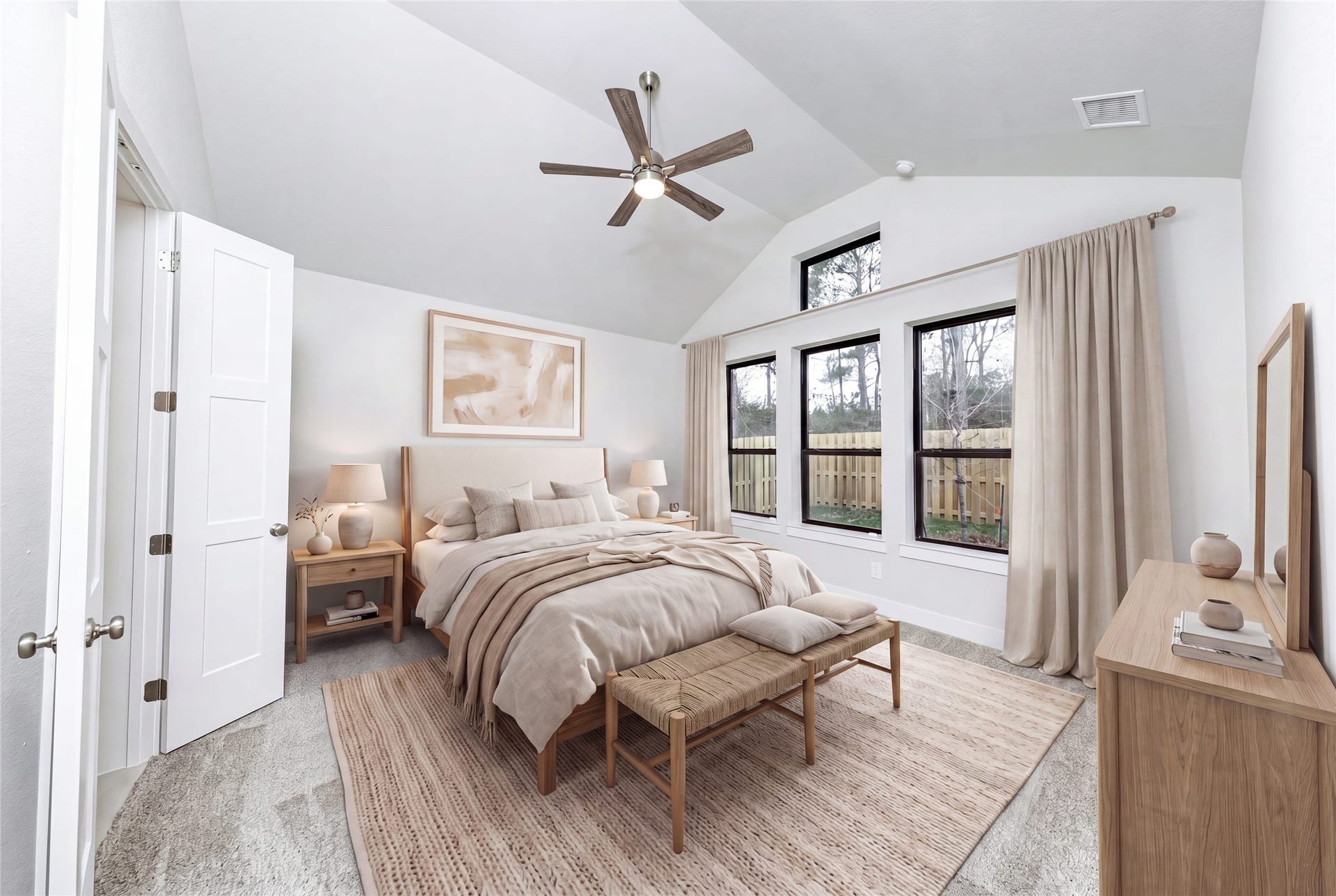 1915 Langford Street, Montgomery, TX 77316 Relax and unwind after a long day in this impressive primary suite! This generously sized room offers plush carpeting, neutral-toned paint, high ceilings with a ceiling fan, and large windows for added comfort and tranquility. *Virtually Staged