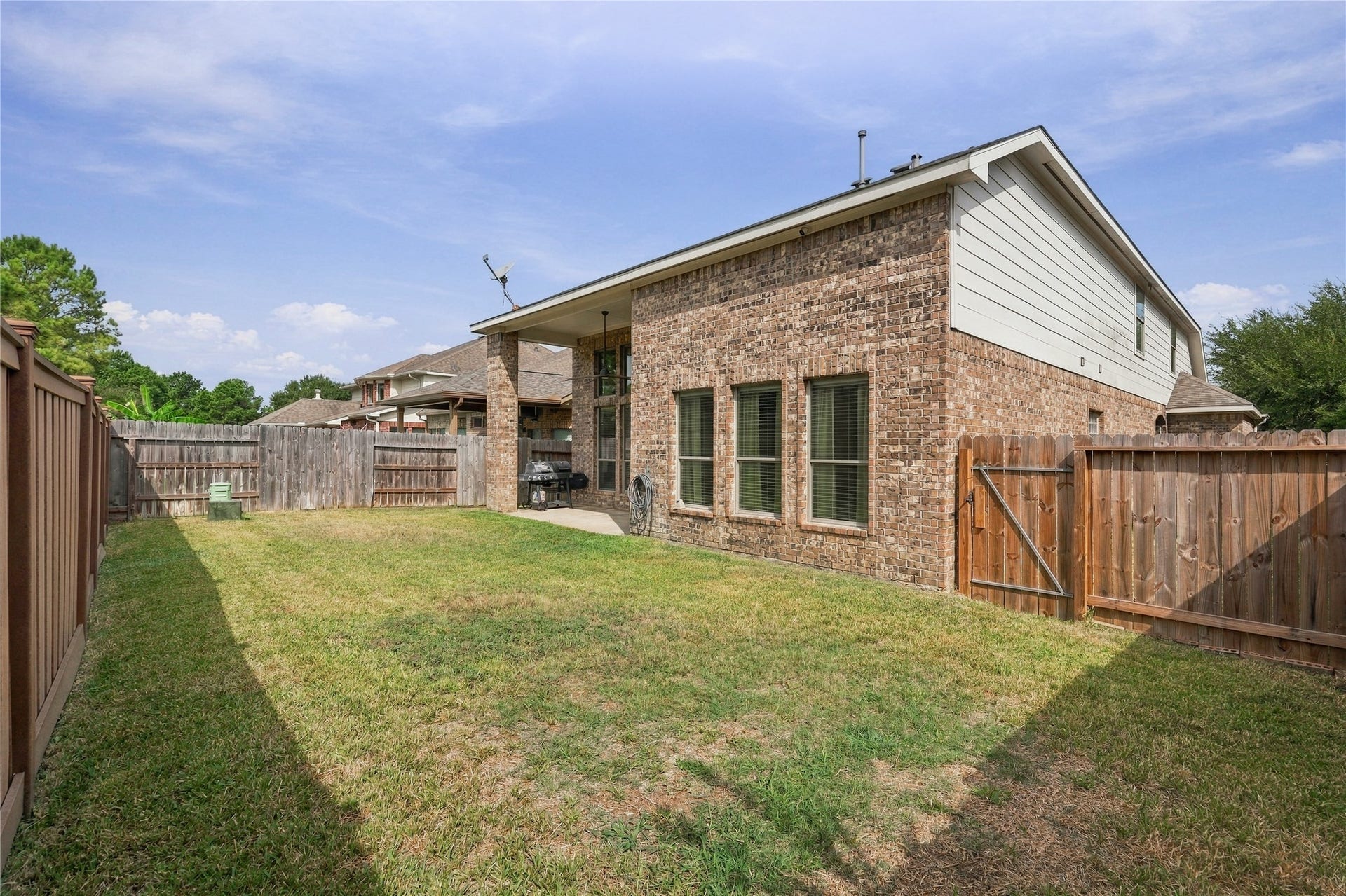 20815 S Blue Hyacinth Drive, Cypress, TX 77433 Create your own outdoor living room beneath this spacious covered patio.
