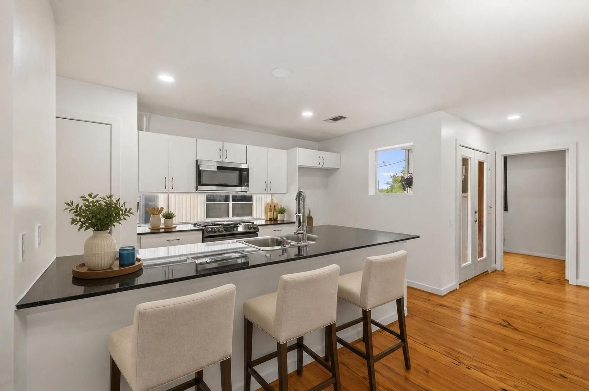 6128 Grand Boulevard, Houston, TX 77021 Kitchen. Virtually staged.