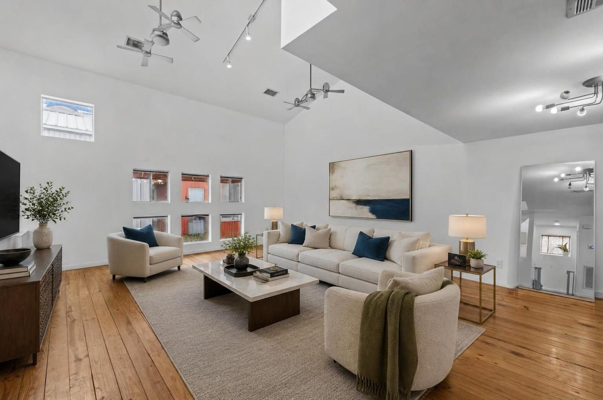 6128 Grand Boulevard, Houston, TX 77021 Living room. Virtually staged.