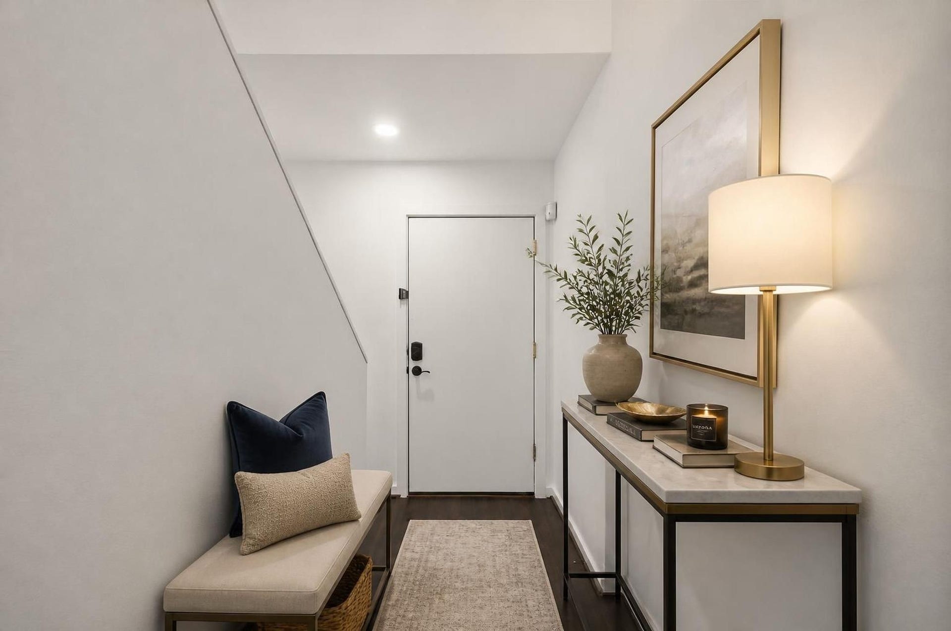6128 Grand Boulevard, Houston, TX 77021 The entry introduces the home with a clean, functional first-floor layout and direct access to the private bedroom suite. Fresh interior paint and refreshed concrete floors give this level a crisp, updated feel. Virtually staged.