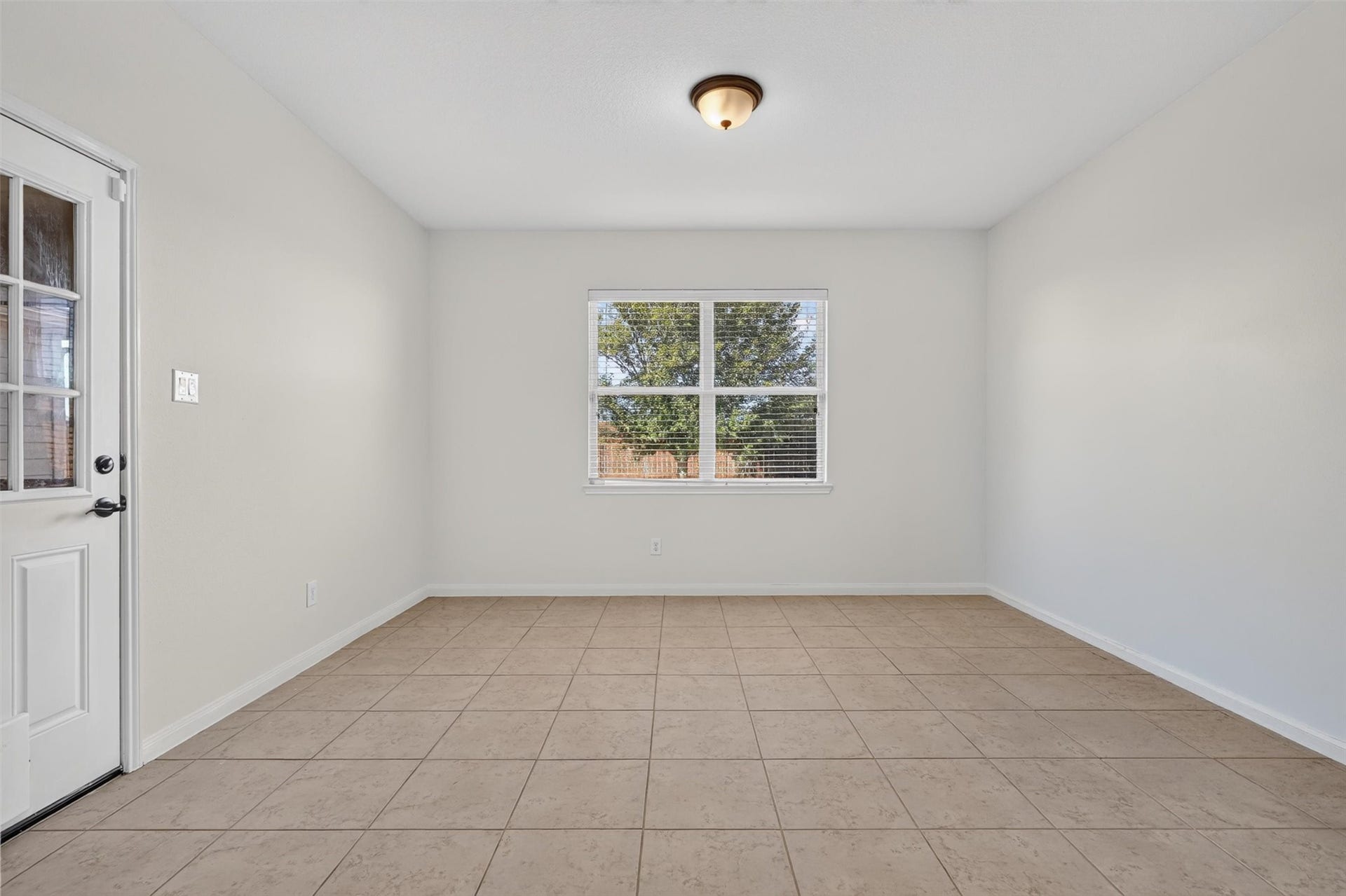 22907 Gentle Shadow Drive, Hockley, TX 77447 while the wide arched opening connects the kitchen to a sunny dining areakeeping everyone together from morning coffee to evening gatherings.