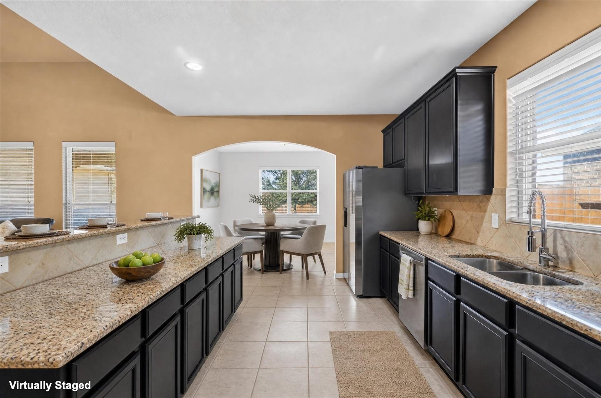 22907 Gentle Shadow Drive, Hockley, TX 77447 Gather, cook, and connect in this spacious kitchen with an adjoining breakfast room!