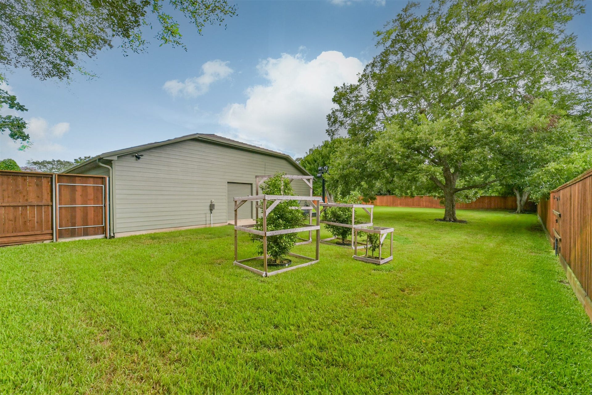 3210 Nottingham Street, Pearland, TX 77581 Fruit trees behind the garage have their own special space.