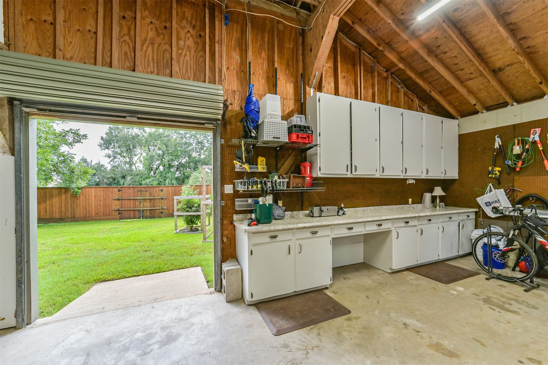 3210 Nottingham Street, Pearland, TX 77581 Workshop area with door to back of the property.