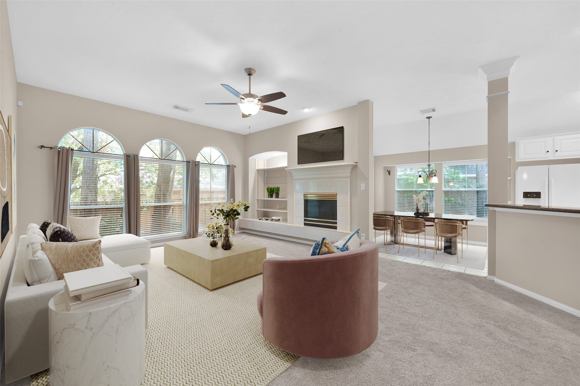 14 Tethered Vine Place, The Woodlands, TX 77382 Virtually staged den that opens to kitchen and breakfast area.