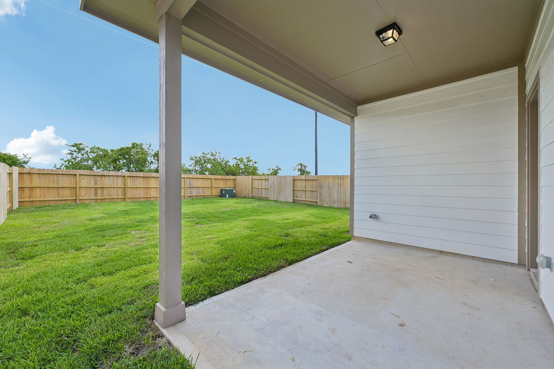 Covered back patio representative photo