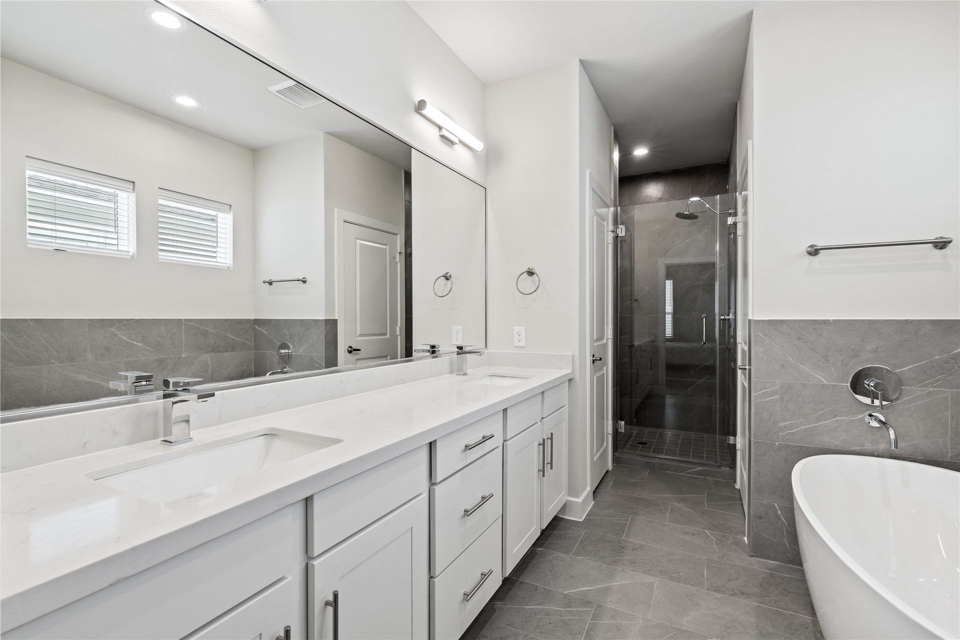 3916 Willowbend Point Drive, Houston, TX 77025 Representative photo showing the communitys model home primary bathroom. Layout and selections may vary.