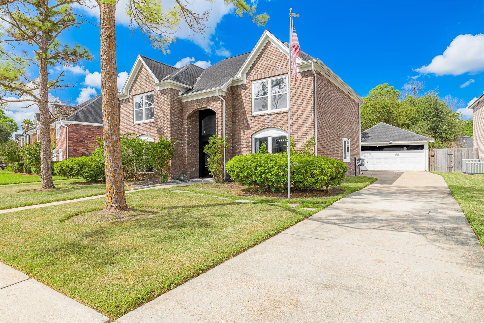 Ample Driveway & Detached Garage