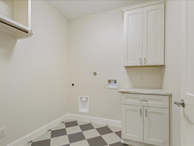 3411 Avenue J 1/2, Santa Fe, TX 77510 Spacious utility room is large enough for refrigerator/freezer
