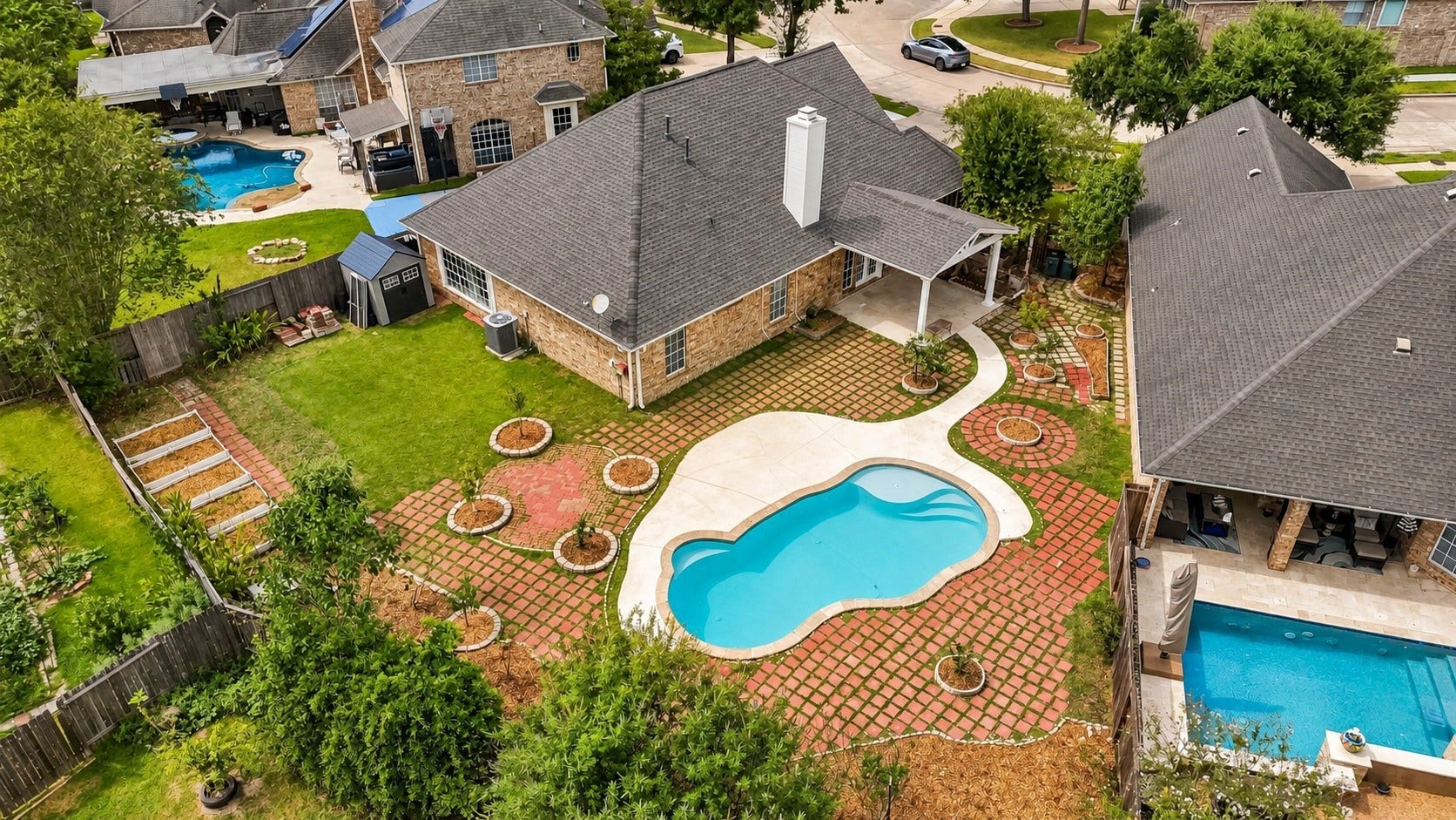 2611 Oxhill Court, Pearland, TX 77584 This aerial view showcases the propertys expansive 10,934 sqft lot.