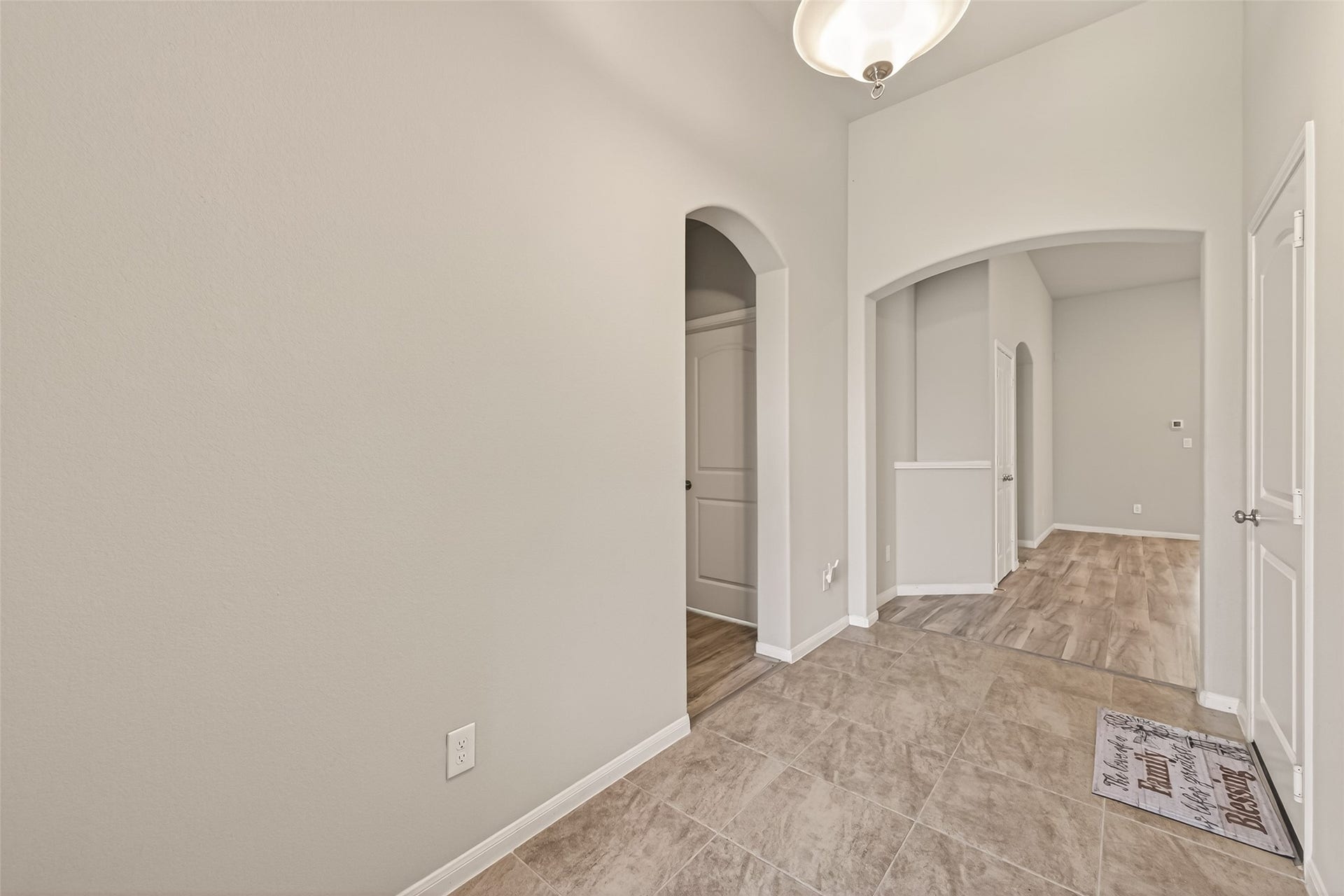 20427 Alpine Meadow Place, Richmond, TX 77407 A spacious foyer offers an open introduction to the home's thoughtful layout.