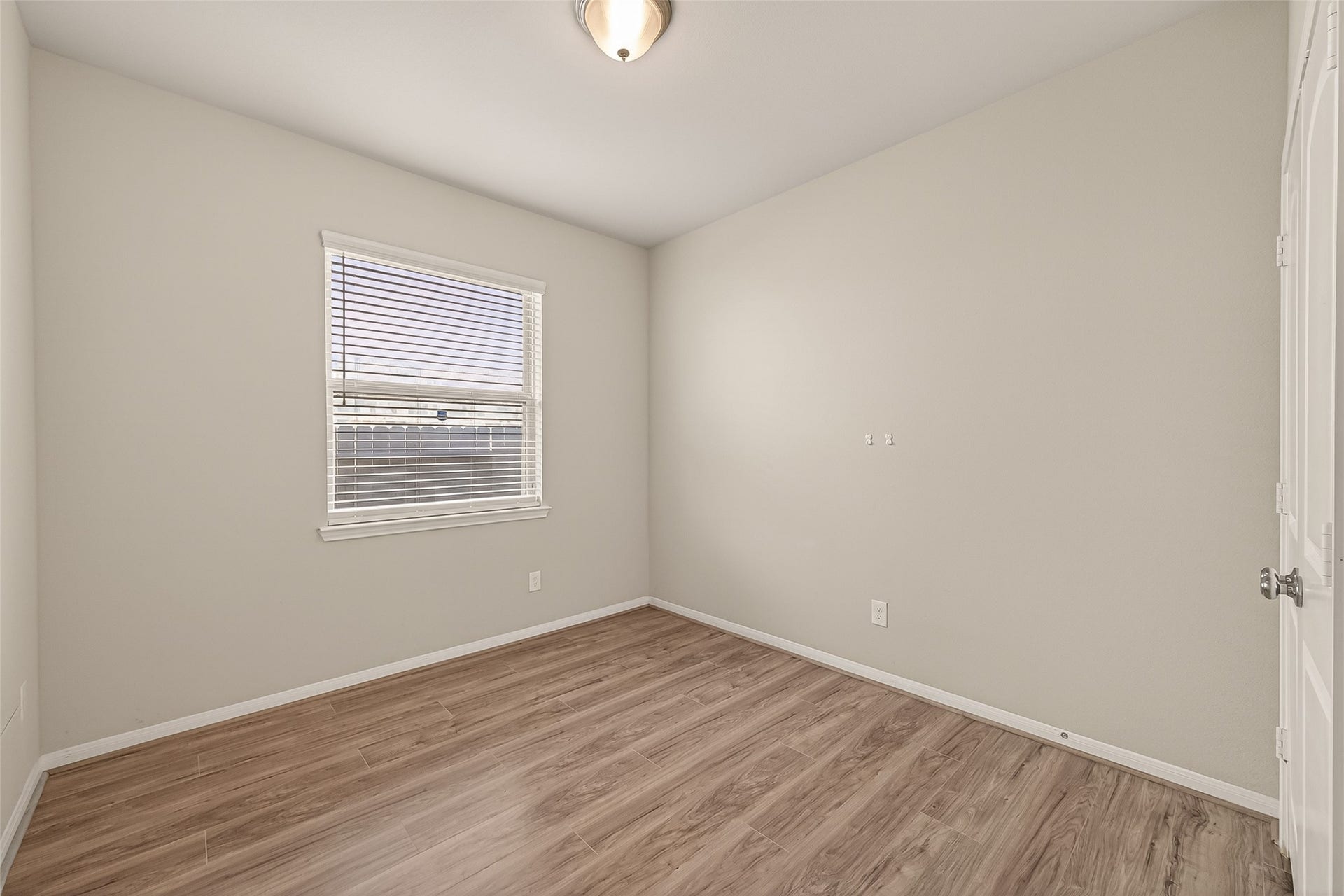 20427 Alpine Meadow Place, Richmond, TX 77407 Secondary bedroom with great natural light and versatile space for family, guests, or a home office.