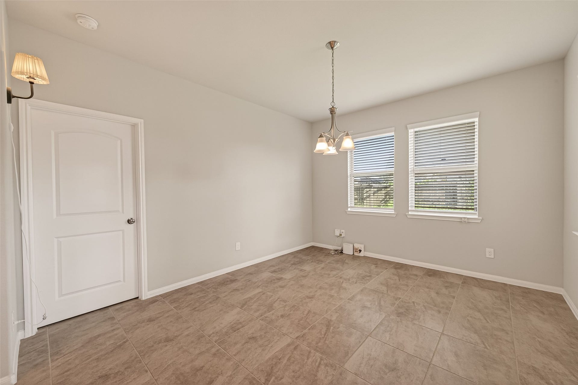 20427 Alpine Meadow Place, Richmond, TX 77407 The dining space is filled with natural light and offers easy access to the heart of the home.
