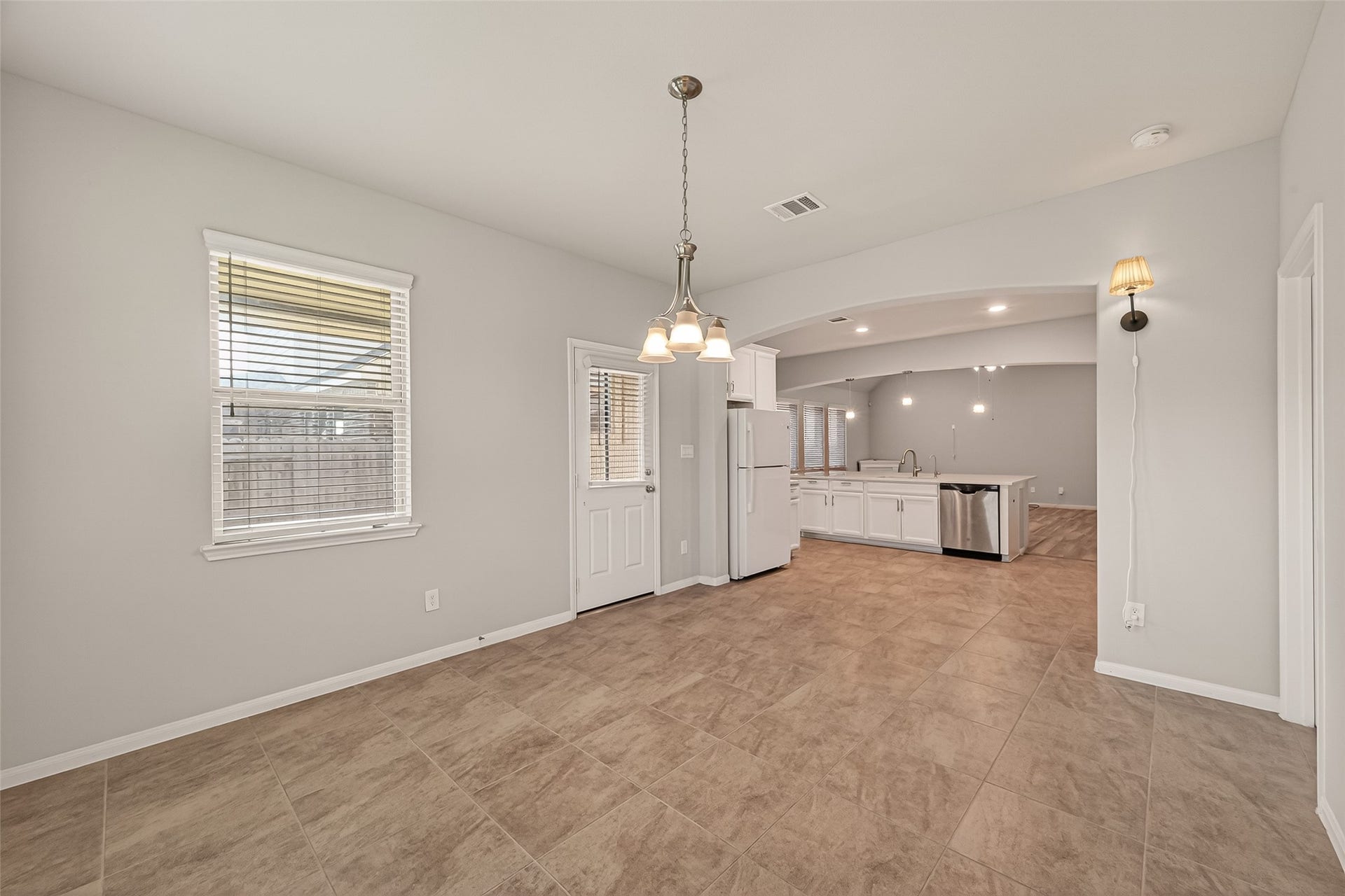 20427 Alpine Meadow Place, Richmond, TX 77407 Another view of the dining area showcasing its open feel and flexible layout.