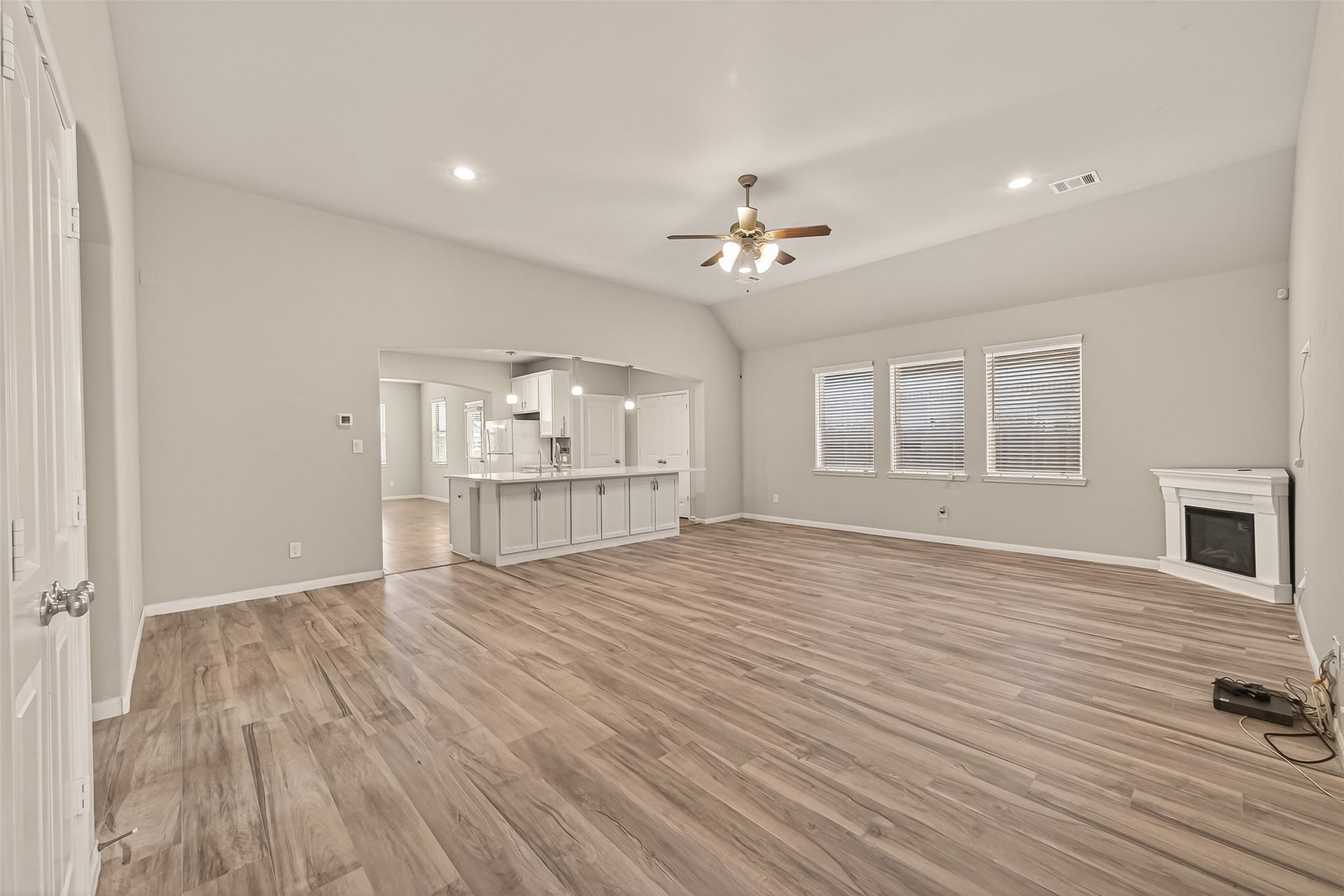 20427 Alpine Meadow Place, Richmond, TX 77407 The living room is filled with natural light and offers plenty of space to gather and relax.