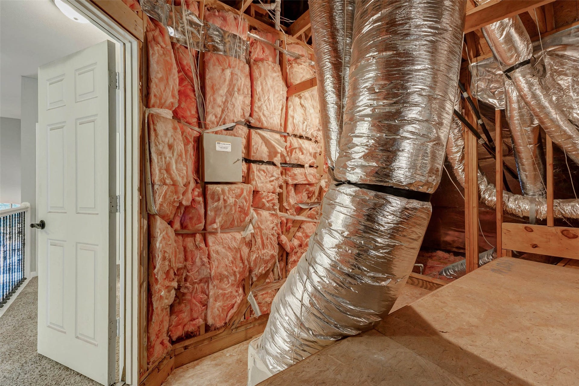 This photo shows the large floored attic area we call the Texas Basement!  The area is accessible via a door from  the upstairs hallway and makes pulling stored items so much easier.  This door can be locked to limit access.