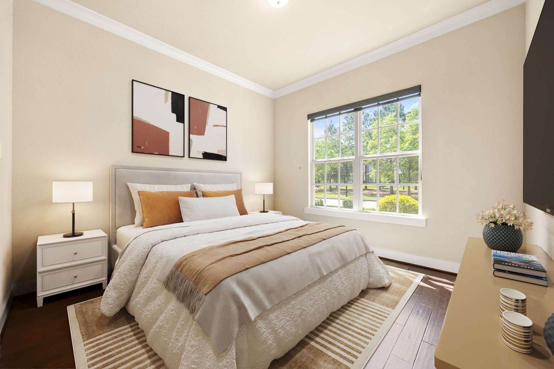 14 Kendrick Pines Boulevard, The Woodlands, TX 77389 This luxurious downstairs guest suite offers a serene and private escape, rare for this floor plan. Elegant crown molding and a crisp neutral palette create a sophisticated atmosphere, while a large window invites peaceful views of the lush surroundings and fills the room with natural light. With easy access to its own full bath, this beautifully appointed space ensures ultimate comfort and privacy for long-term guests or multi-generational living.