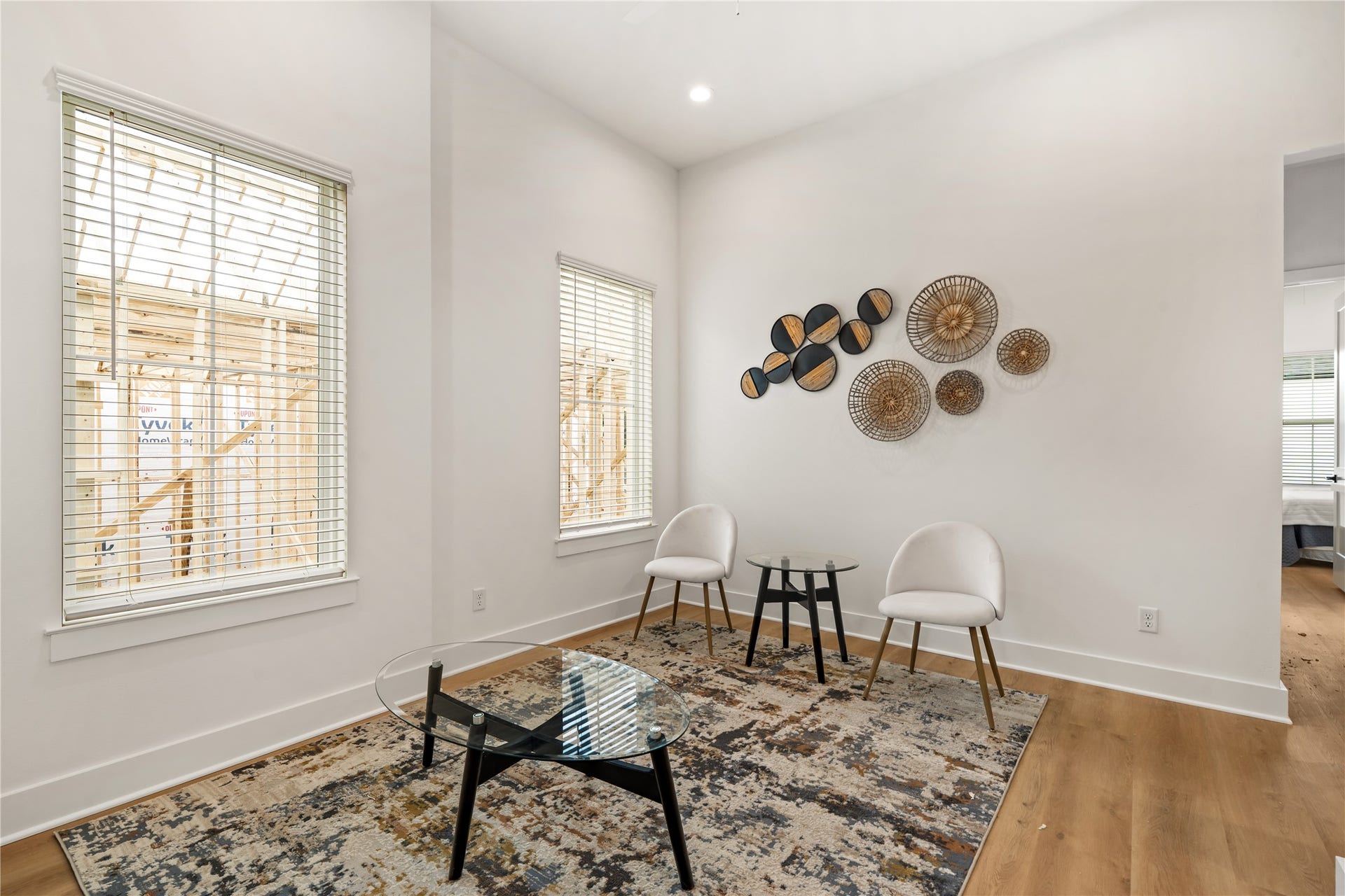 Sunlit secondary seating area or flexible flex space for an upstairs lounge or work nook.