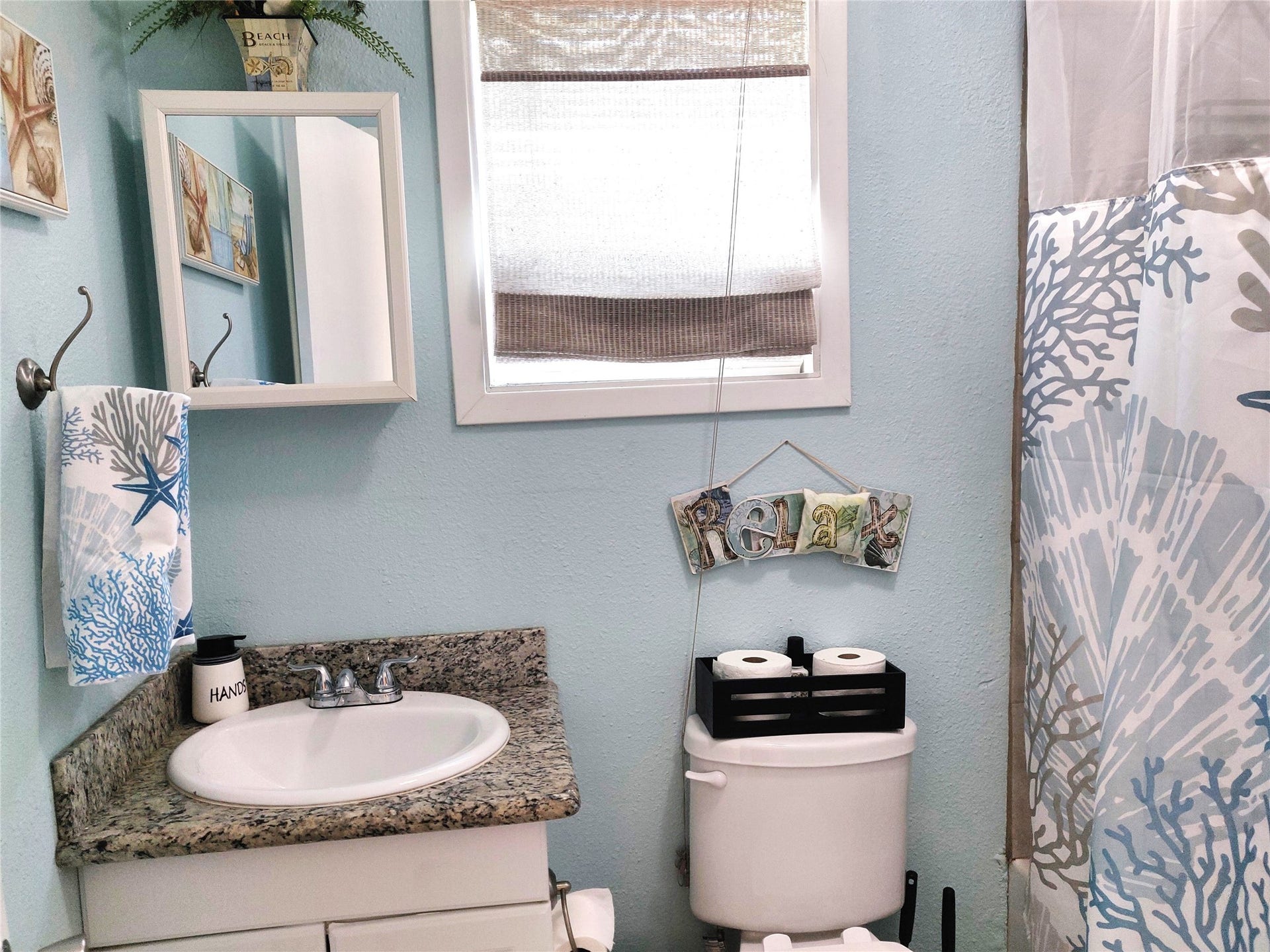 4711 Avenue S, Galveston, TX 77551 The primary bedroom has an ensuite bathroom with a walk-in shower