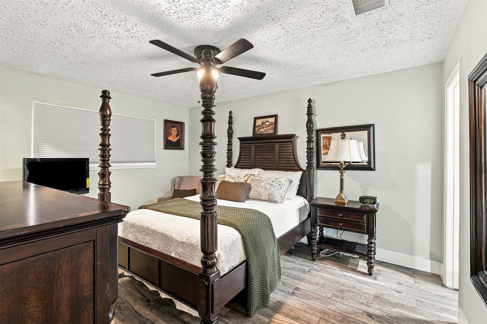 22611 Carter Moir Lane, Katy, TX 77449 Primary bedroom offers generous space for substantial furnishings, updated flooring, ceiling fan, and private bath access.
