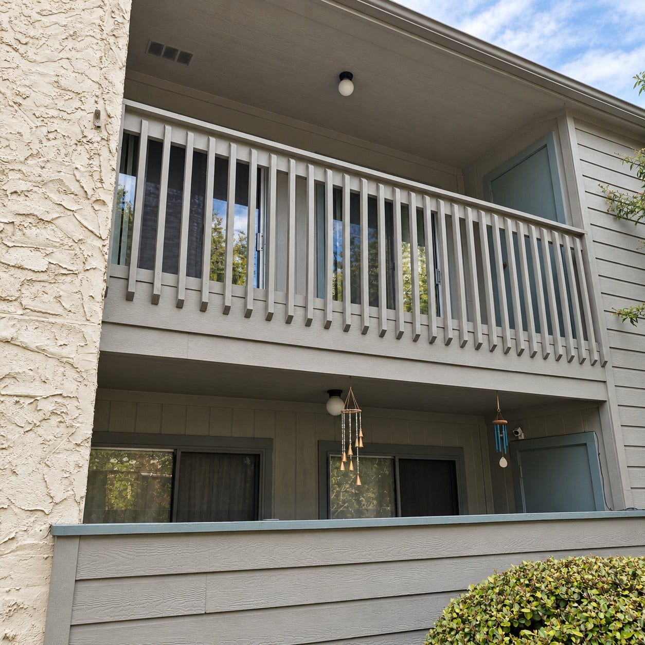 260 El Dorado Boulevard, #808, Houston, TX 77598 View of the balcony from the walkway to the green area and pool.
