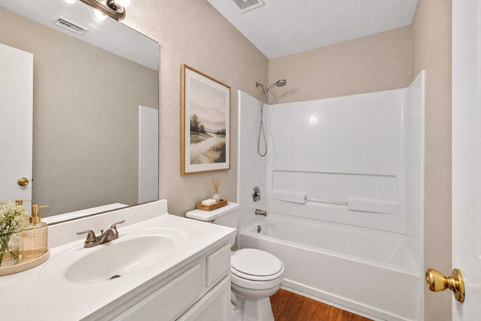 19547 Fletcher Way Drive, Houston, TX 77073 Virtually staged decor adds a finishing touch while leaving the bathrooms existing fixtures and finishes unchanged.